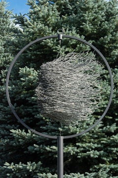 Waves - tall, metal, abstracted human face, coated steel outdoor sculpture