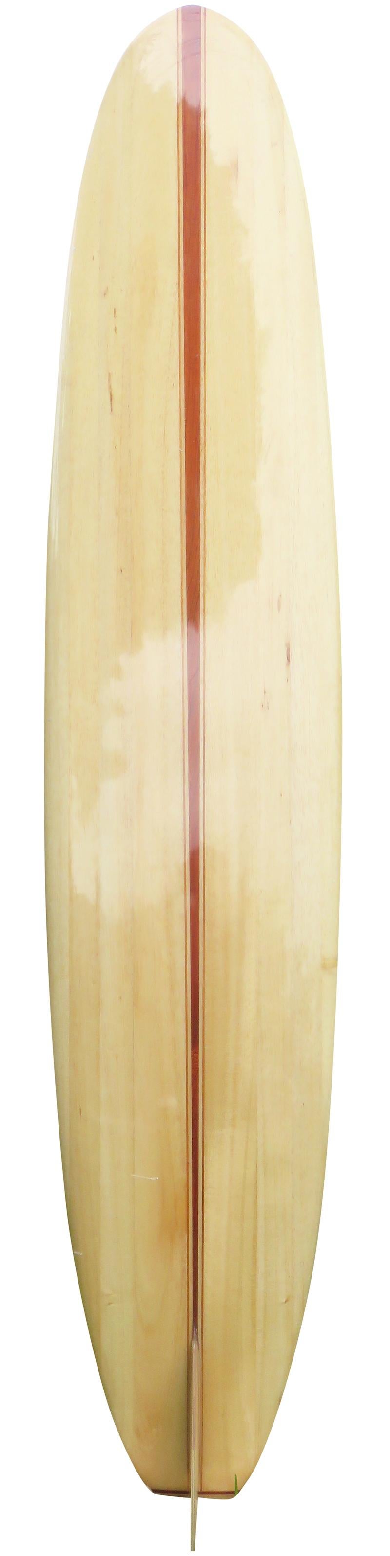 Early 2000s Velzy balsawood longboard shaped by the late Dale Velzy (1927-2005). Features a triple redwood stringer design with beautiful balsawood and redwood 