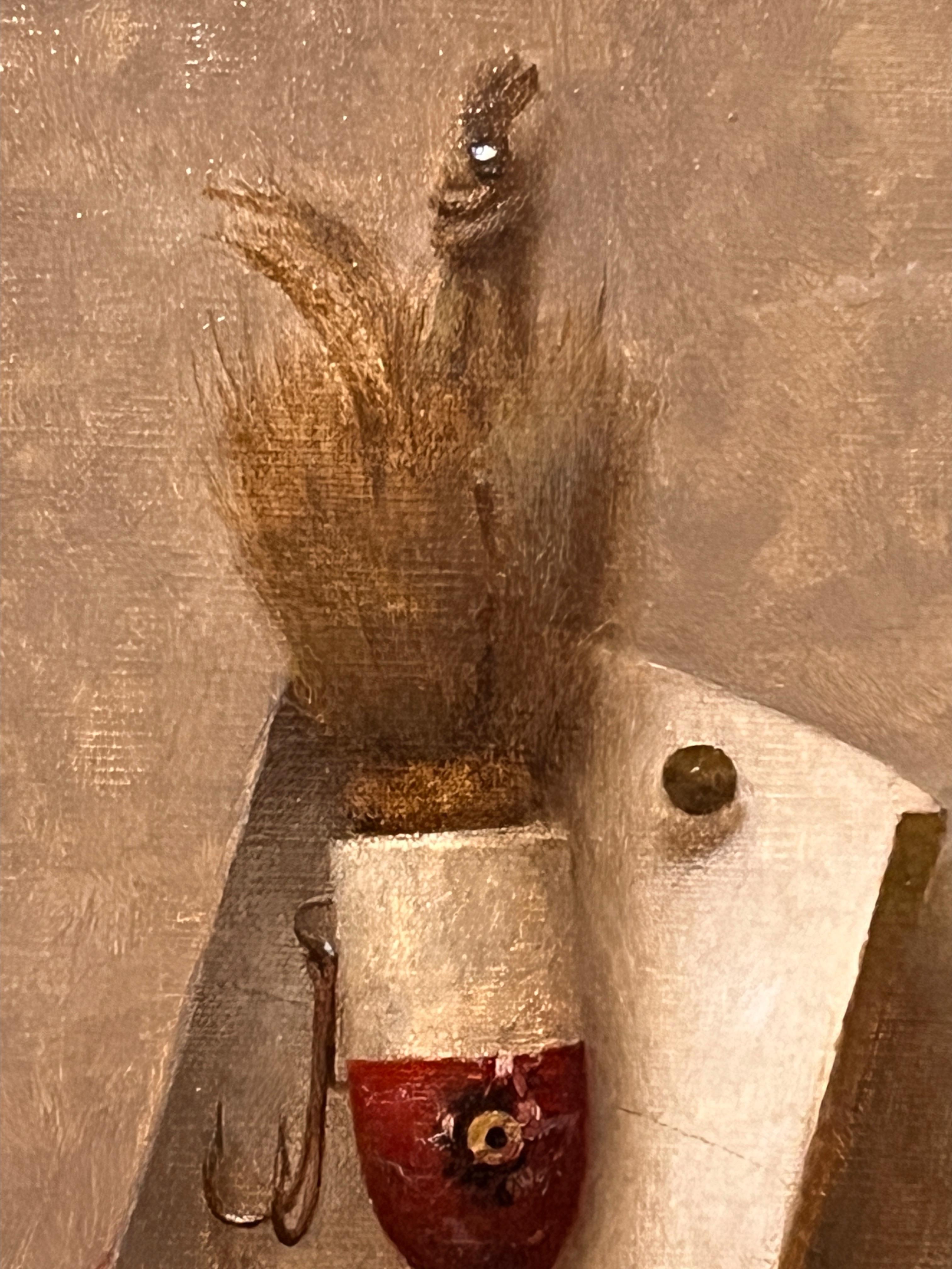 Une peinture à l'huile originale sur panneau de lin représentant un leurre de pêche antique, encadrée dans un cadre fait main par l'un des meilleurs encadreurs de New York.

Le maître peintre de natures mortes Dale Zinkowski est né à New York et ses