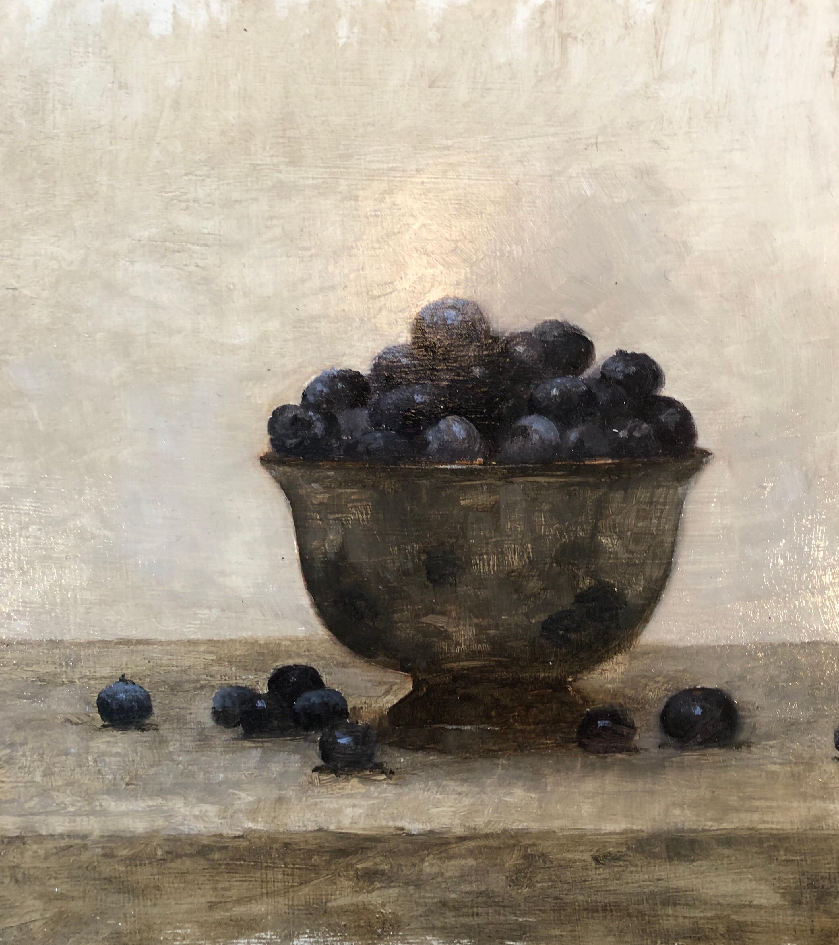 A gem of a little still life, smartly framed in a minimal black frame is this oil painting on panel of blueberries in a pewter bowl. Beauty is simplicity reigns in this quietly commanding piece.

Born in New York, Dale’s earliest memories of