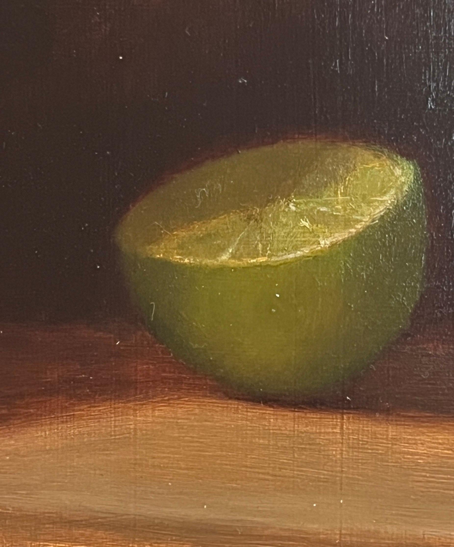 Dale Zinkowski is a master of still life. His work, reminiscent of Golden Age Dutch still life painting, glows with light and subtle, quiet beauty. This original oil painting shows a pyramid of limes dramatically placed against a dark background so
