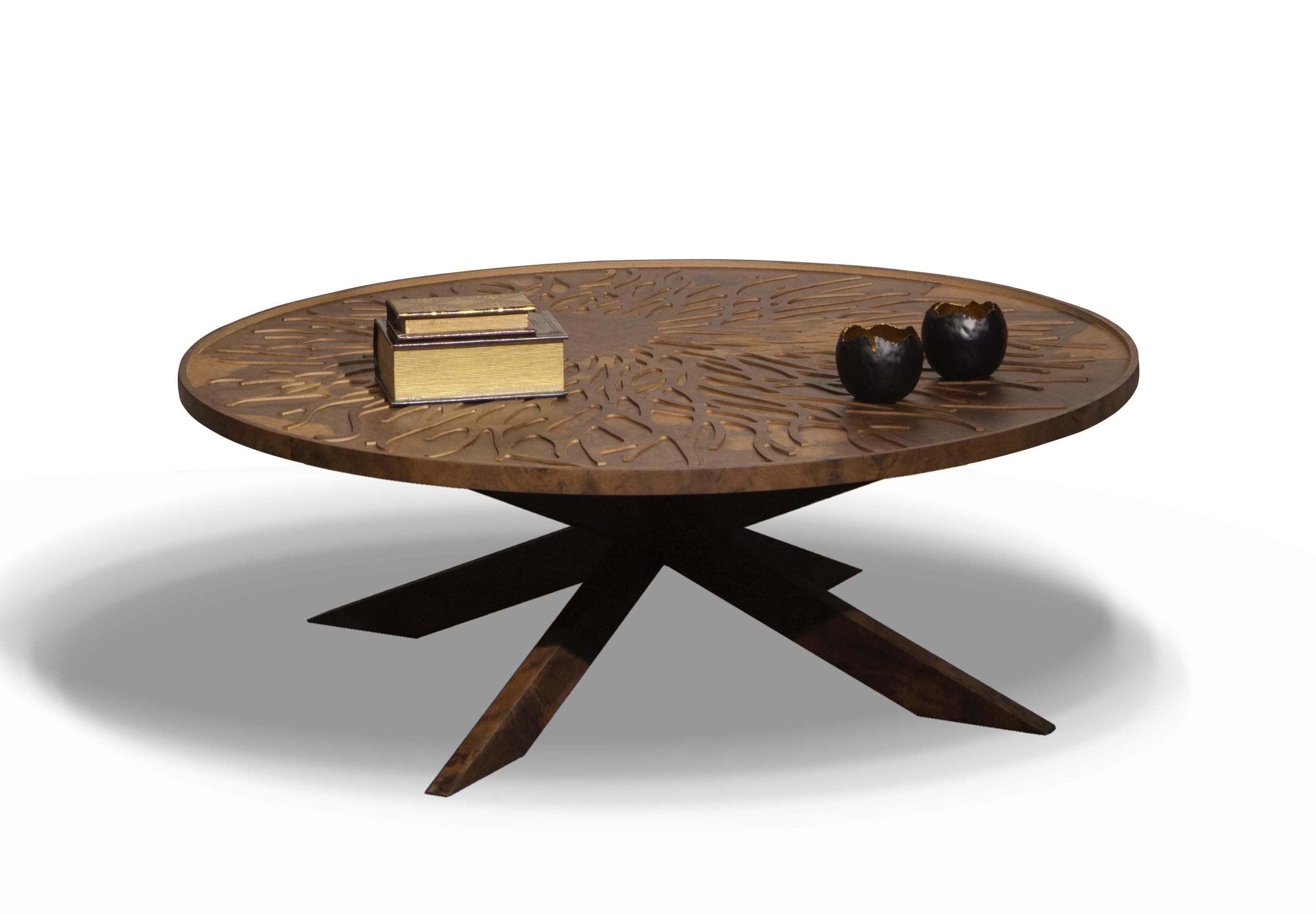 Solid wood intricately engraved with Sisli’s signature branches makes this coffee table an artful addition to the center of any seating area.