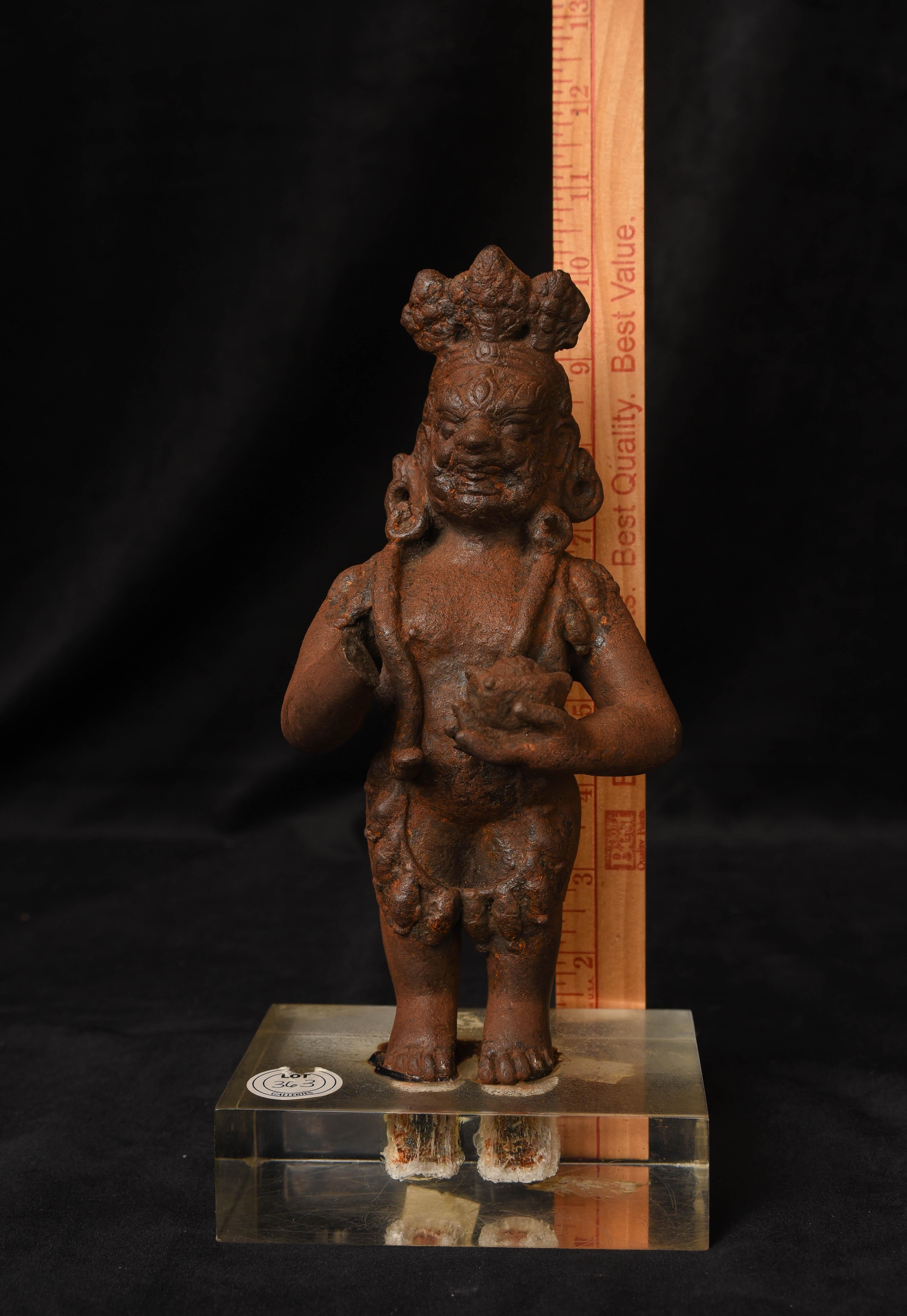 This is a fierce Buddhist deity cast in iron. Probably from the Dali Kingdom, 10/11thC South of China. Possibly early Tibetan. Solid cast. Condition as shown in photos- generally good, with an ancient iron patina that grows out of the metal. He is