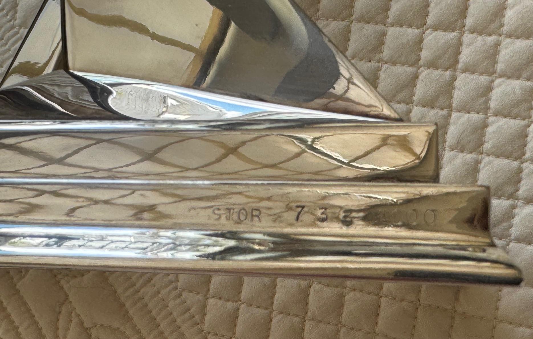 Paire de sculptures ou bougeoirs en bronze argenté de Dali 