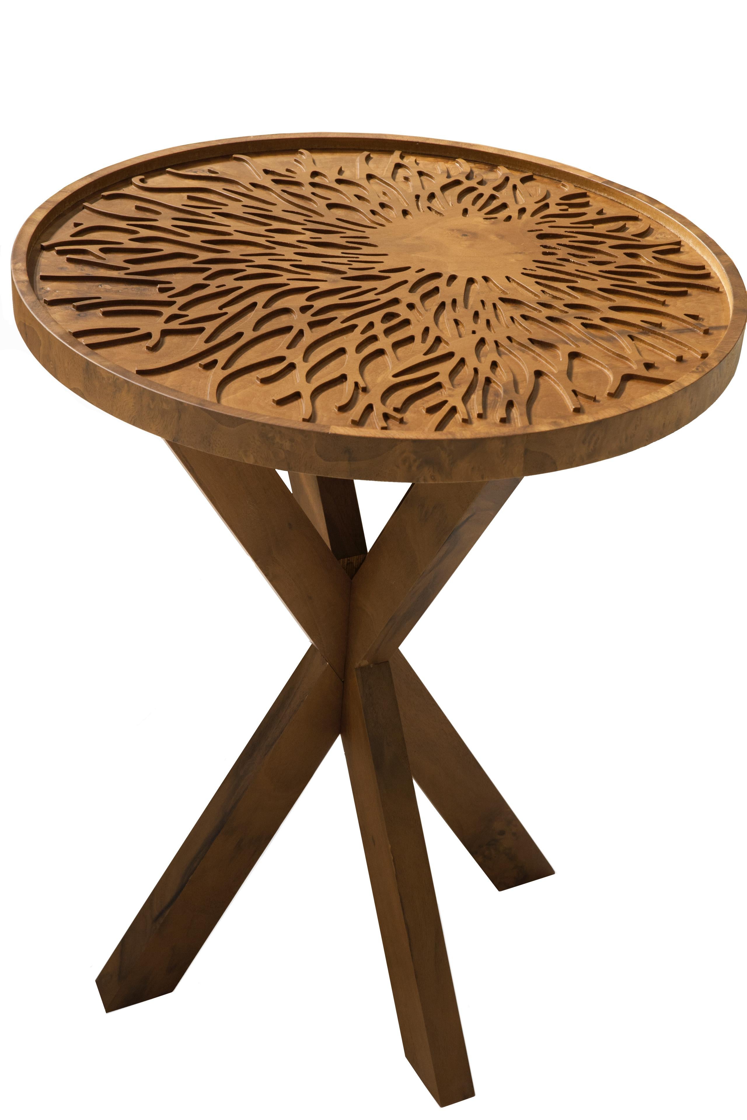 Solid wood intricately engraved with Sisli’s signature branches makes this side table an artful addition to any seating area.