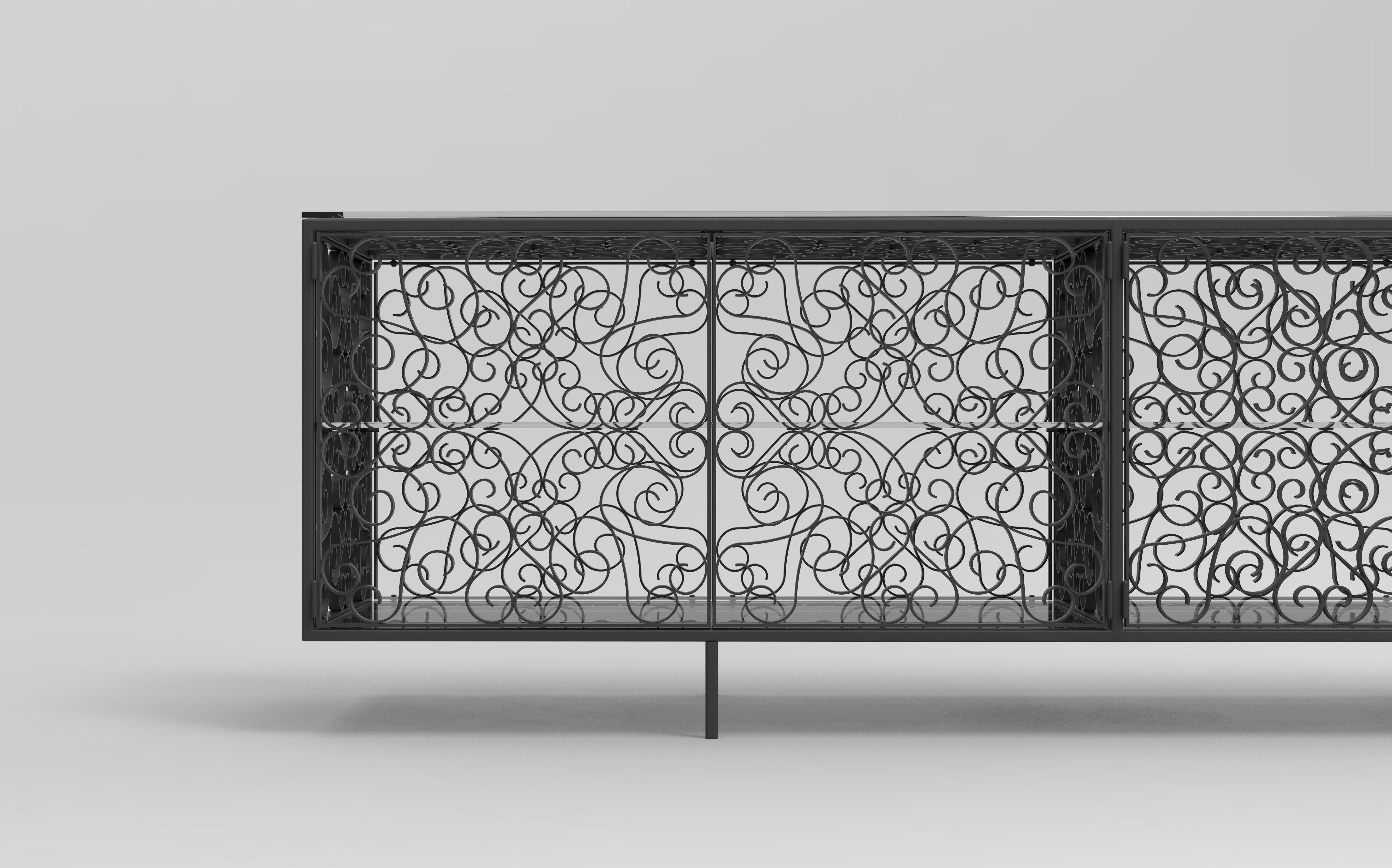 Dalia Cabinet designed by Joel Escalona for BD Barcelona. The design follows a traditional iron forging style which makes the structure looks protective and decorative. Joel Escalona is a Mexican designer so that this structure follows the Mexican