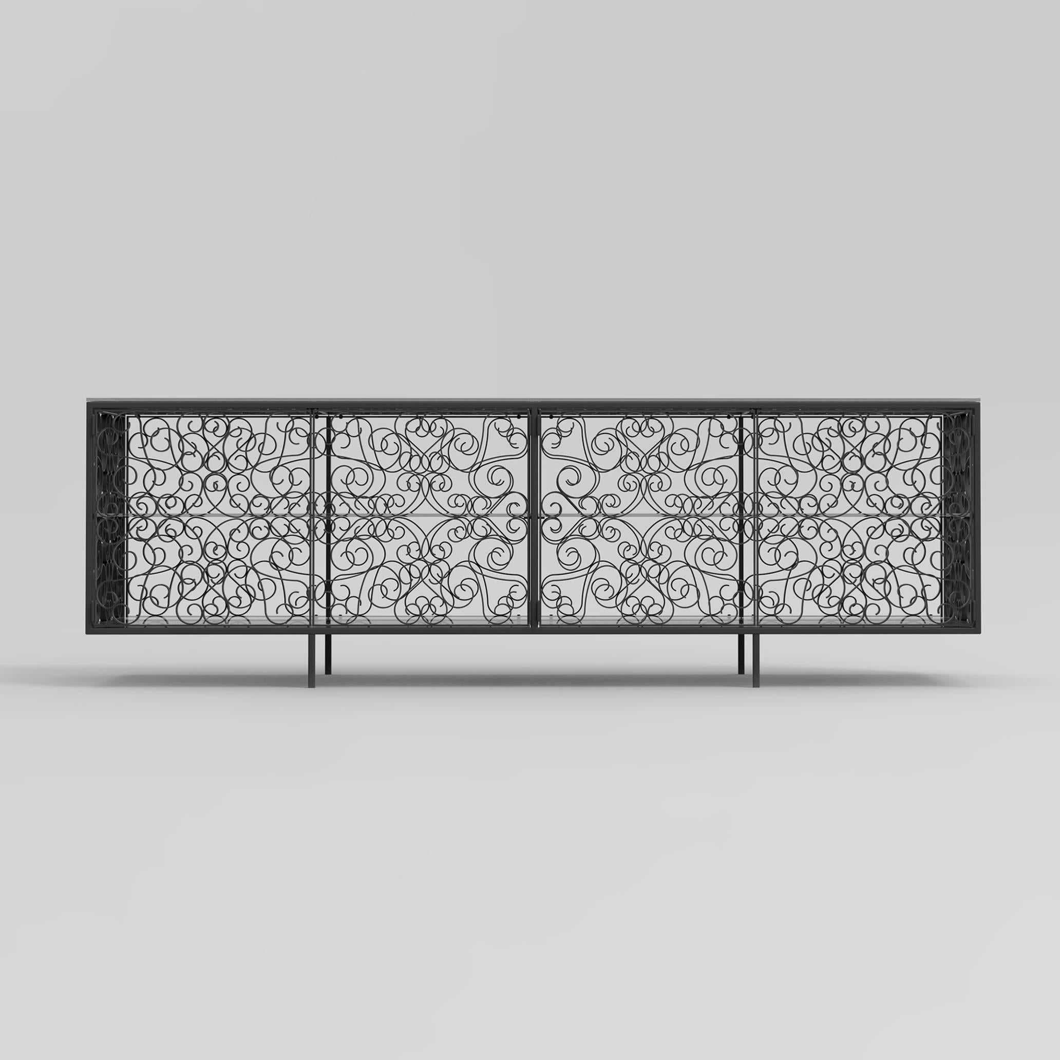 The Dalia cabinet designed by Joel Escalona manufavtured by BD in Barcelona.

The Dalia cabinet is inspired in traditional iron forging, a method used with the purpose of protecting and decorating.
Cast aluminium structure in an anthracite grey,