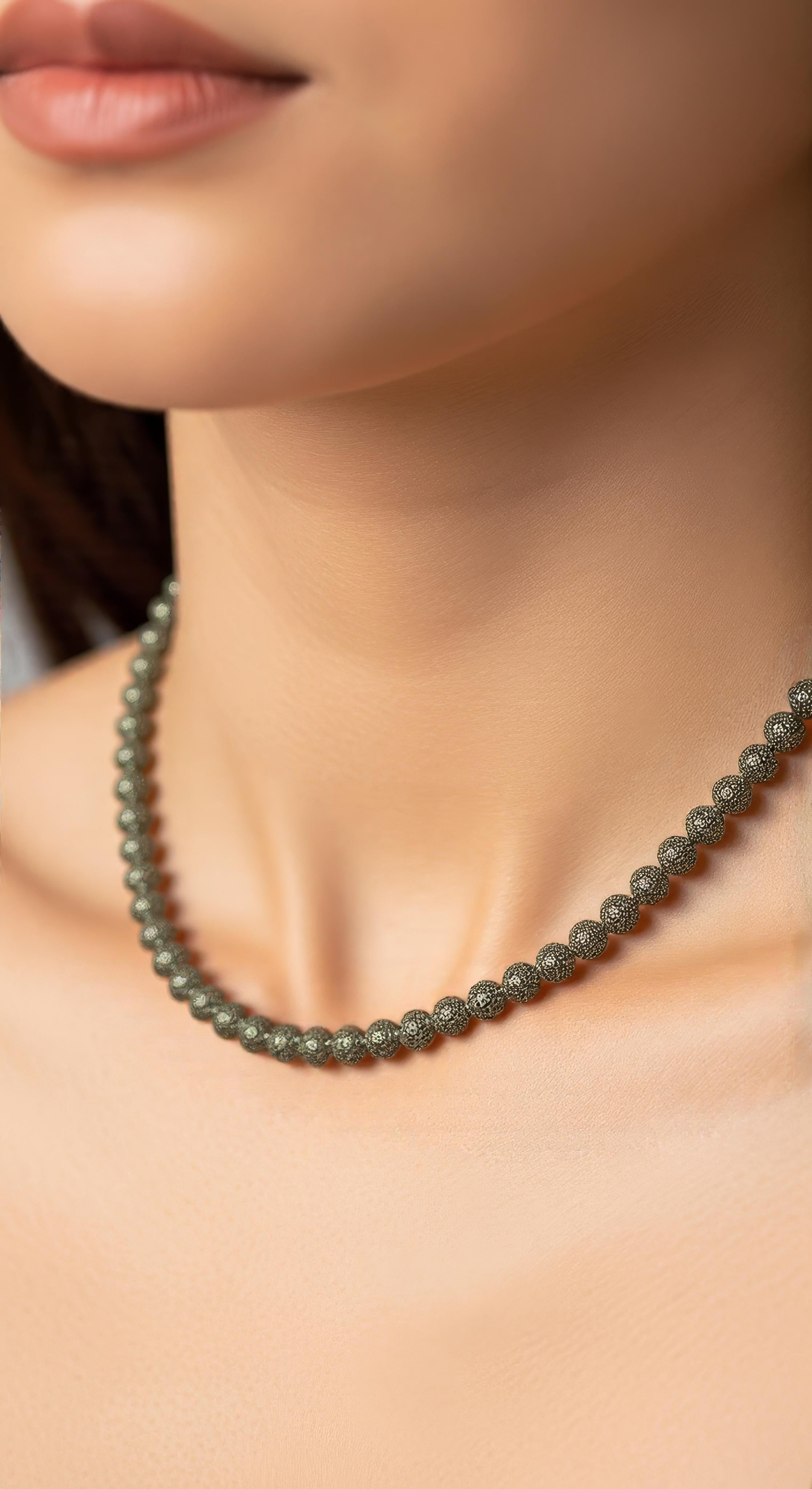 Discover this striking Dalmatian Jasper beaded necklace, a unique piece blending natural charm with elegant craftsmanship by nlanlaVictory

Handcrafted with precision, this new necklace features 10mm Dalmatian Jasper beads, known for their playful