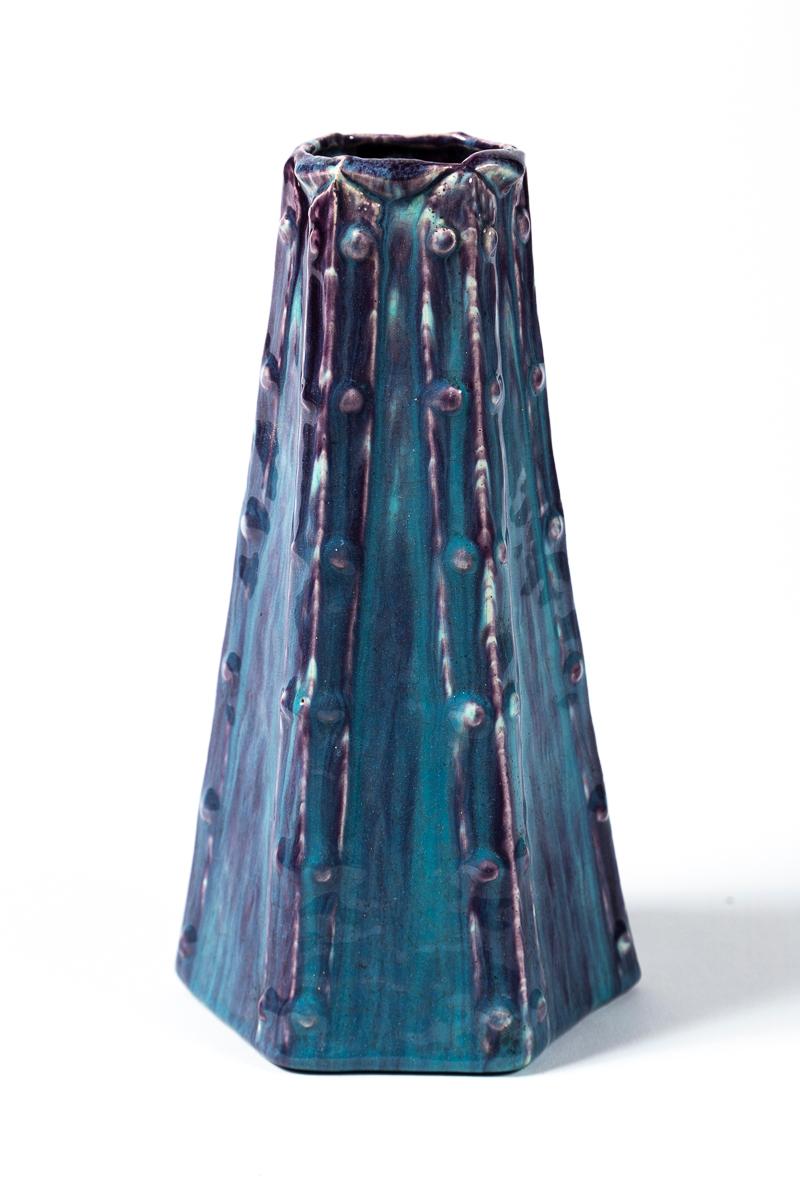 Dalpayrat Style Art Pottery Cabinet Vase, France, circa 1900. Layered glazes in purple and blue with applied, raised design. In the style of Adrien Dalpayrat (1844-1910), renowned French ceramicist of the Art Nouveau period.