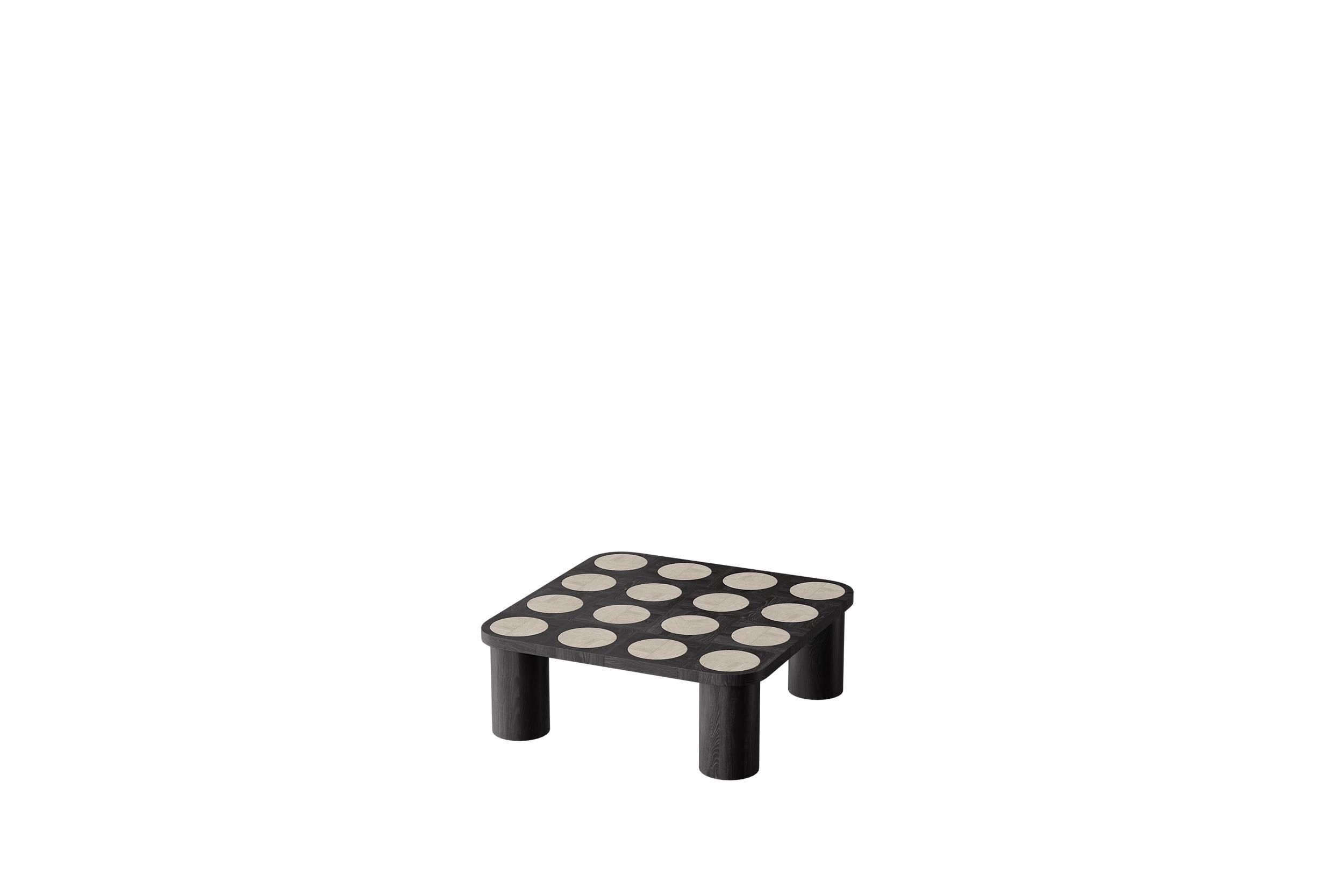 Dama Ocassional Table in Black Oak with Travertine Inserts by Ultramobili
Dimensions:  W 104 x D 104 x H 38 cm
Materials: Black Oak structure with natural travertine inserts.

Circle and square, black and white – let’s play! Coffee table DAMA is a
