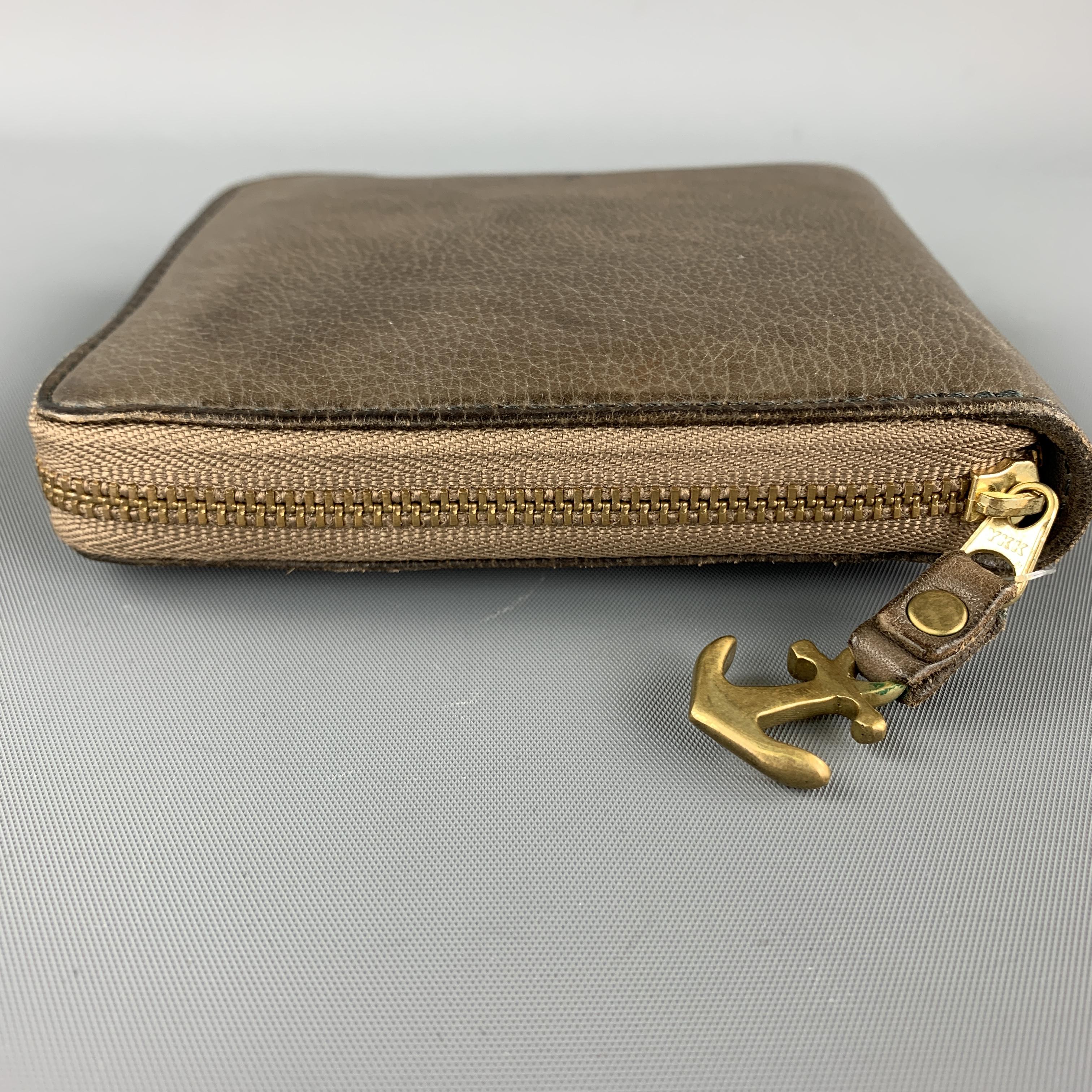DAMASQUINA wallet comes in a brown leather featuring a bill compartment, card slots, and a zipper closure. As Is. 

New With Box.

Measurements:

Length: 4.5 in.
Width: 1 in.
Height: 4 in.

 

SKU: 100371
Category: Wallet

More Details
Brand: