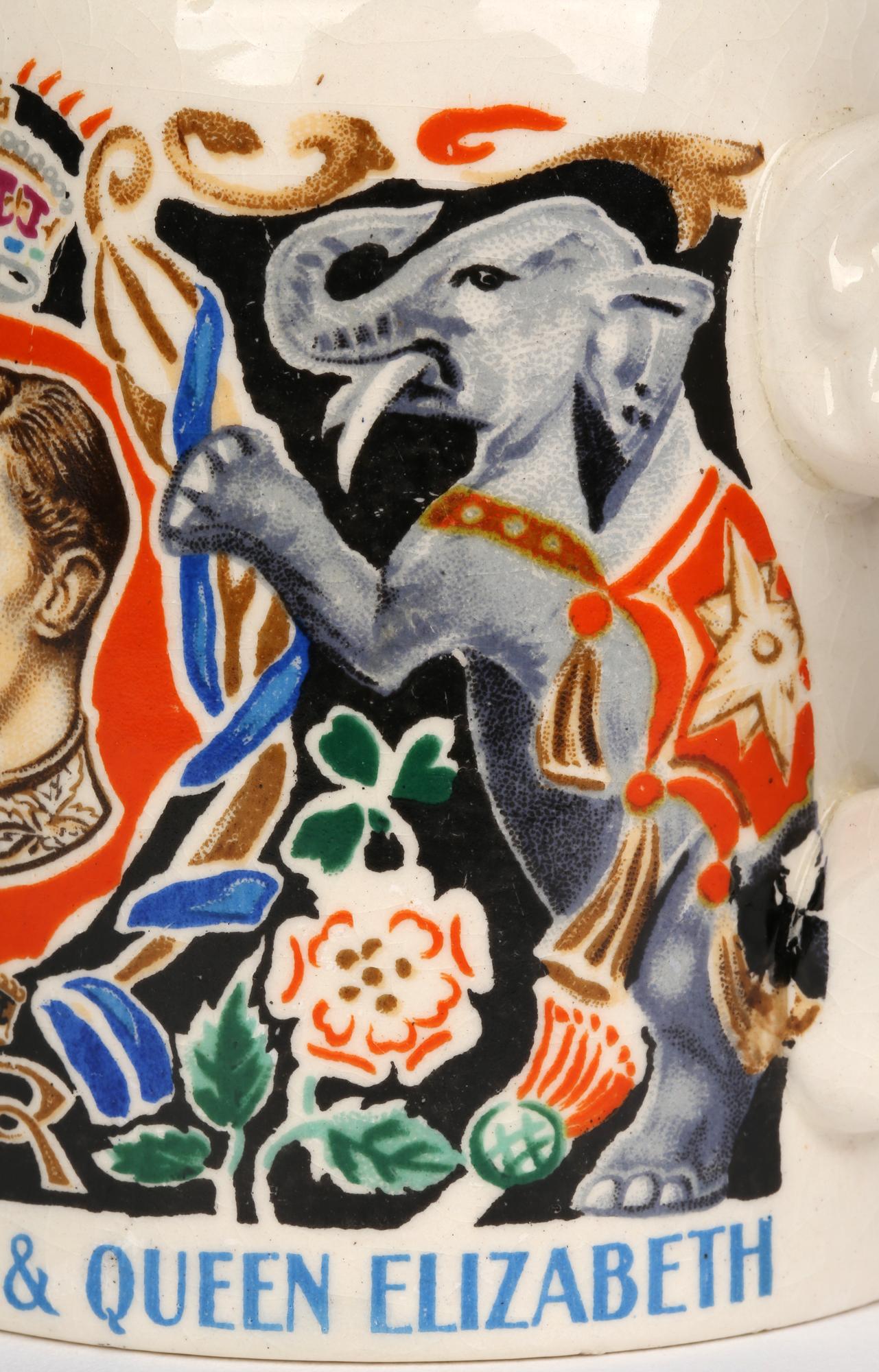 A finely potted mug commemorating the Coronation of their majesties King George VI and Queen Elizabeth designed by renowned English Artist Dame Laura Knight (English, 1877-1970) and dated 1937. This lightly potted earthenware mug is of conical shape