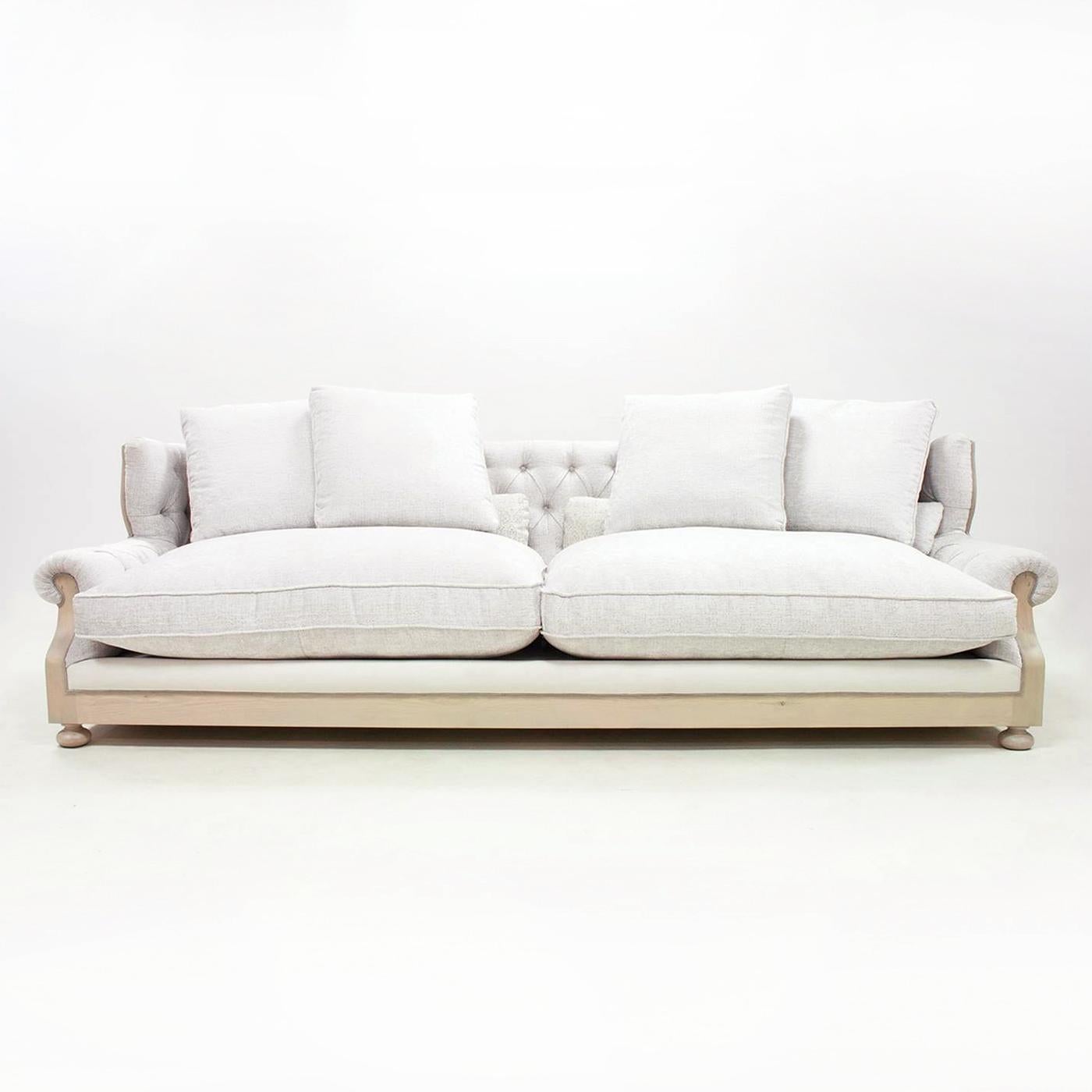 Sofa Damian with structure in solid wood in waxed finish.
2 cushion seater, capitonated back and back cushions (included)
upholstered and covered with high quality old white linen fabric.
With natural cane on back seat and with gilded nails at