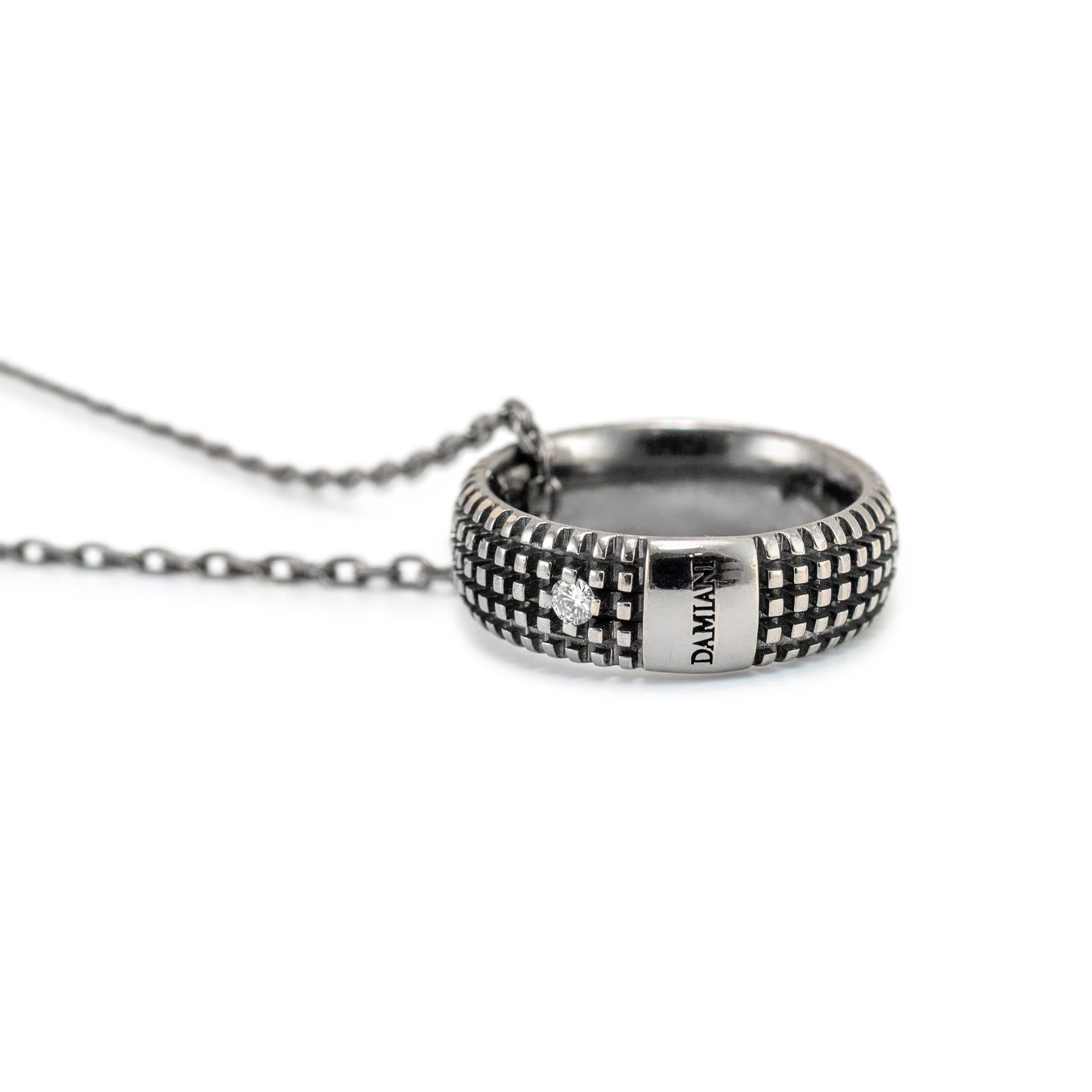 Brand: Damiani 

Metal Type: 18K White Gold

Length: 19.00 inches

Width: 0.90 mm

Weight: 6.80 grams

Black rhodium-plated 18K white gold diamond necklace. The metal was tested and determined to be 18K white gold. Engraved with 