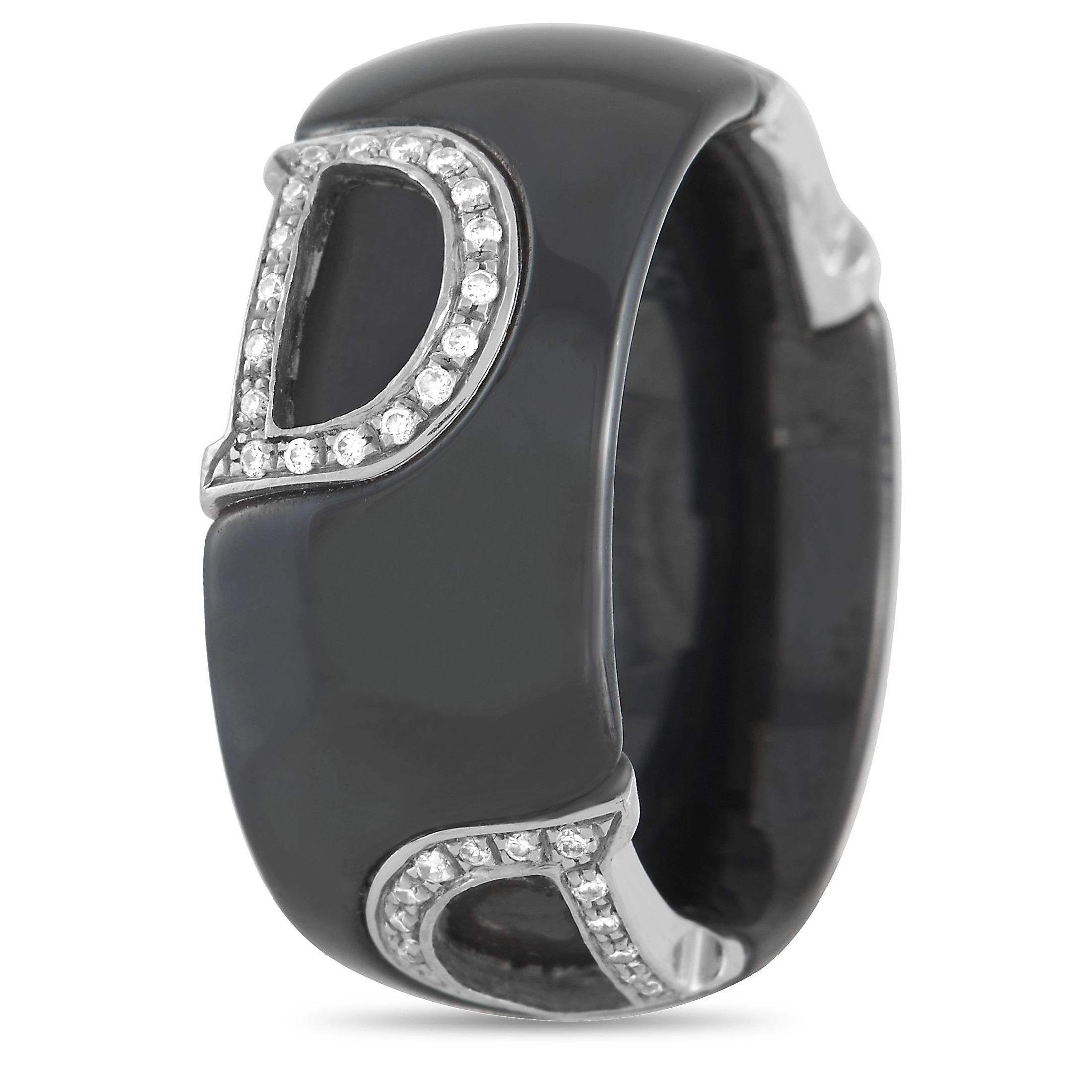 An eye-catching black ceramic band measuring 8mm wide provides the perfect foundation for this captivating ring from Damiani. The luxury brand’s monogram makes a statement thanks to inset diamond gemstones in an 18k White Gold “D” shaped setting. 
