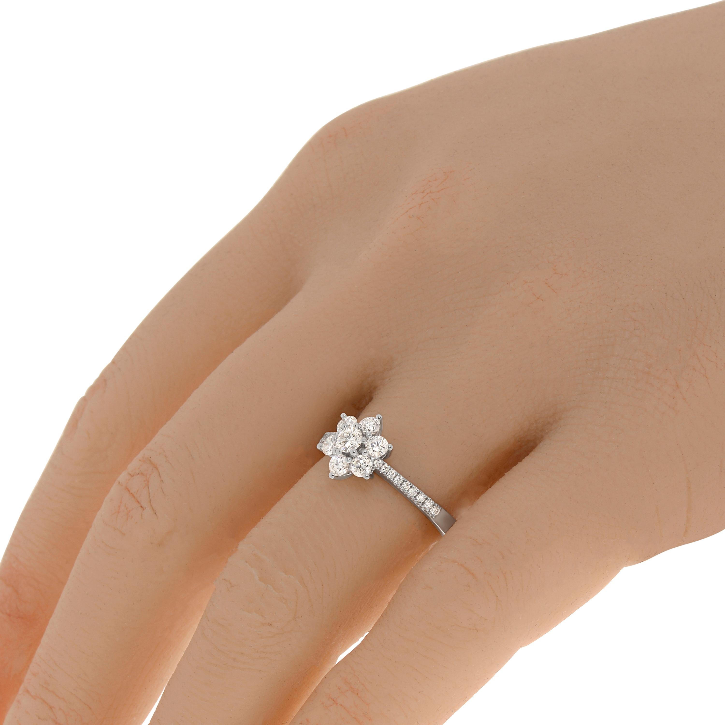 Damiani 18K white gold statement ring features a clustered 0.64ct. tw. diamond flower. The ring size is 6.25 (52.6). The decoration size is 9.5mm. The total weight is 4.2g.
