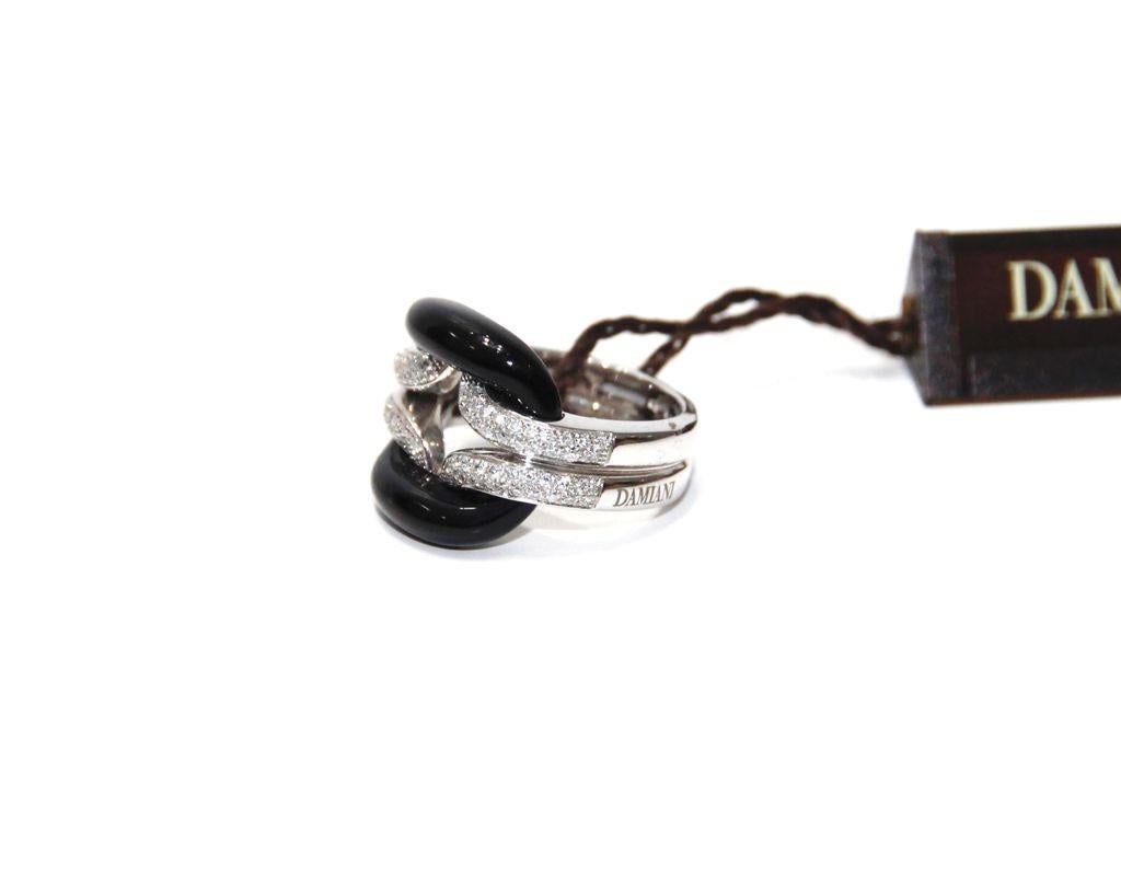 Damiani 18K White Gold Onyx and Diamonds Ring
Diamonds 0.42ctw
Made in Italy 
Size 4
Retail $4,640.00
