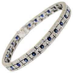 Bracciale Damiani con linea di diamanti e zaffiri rotondi da 4,79 carati totali in oro 18 carati