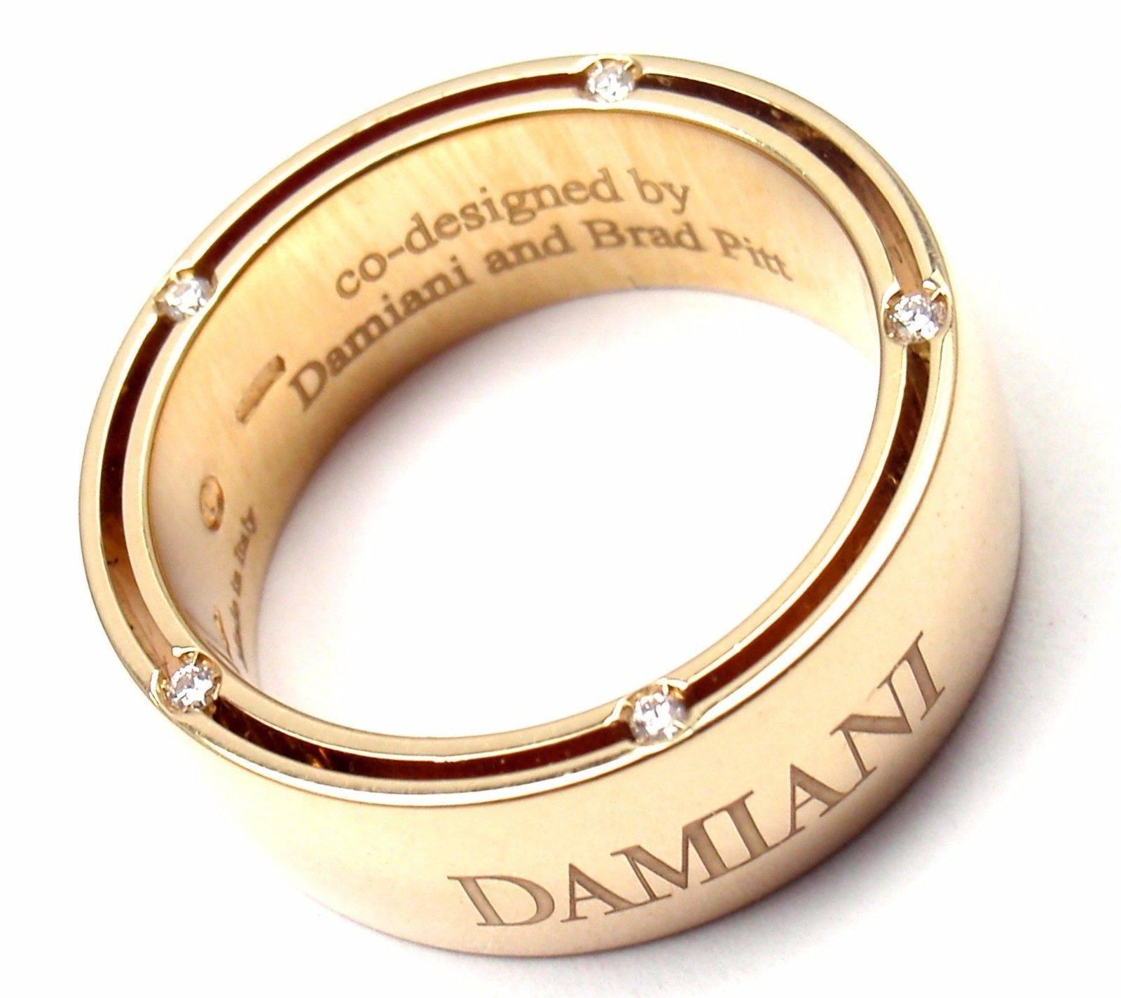 18k Yellow Gold Diamond Band Ring by Damiani And Brad Pitt.
With 5 round brilliant cut diamonds total weight approx .10ct VS1 clarity, G color.
Retail Price: $3,590
This ring comes with Damiani Box + Paperwork.
Details:
Size:  7
Weight: 11.9