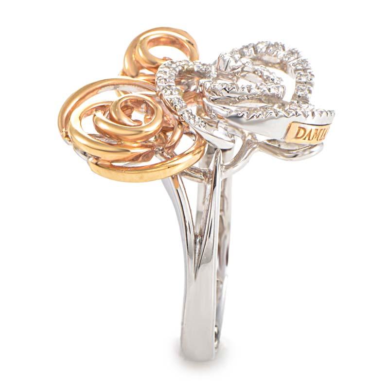 This festive ring from Damiani has a unique design that is sure to garner much attention. The ring is made of 18K white gold and is accented with rose gold swirls that look like avant-garde flowers. Lastly, one flower swirl is made of white gold and