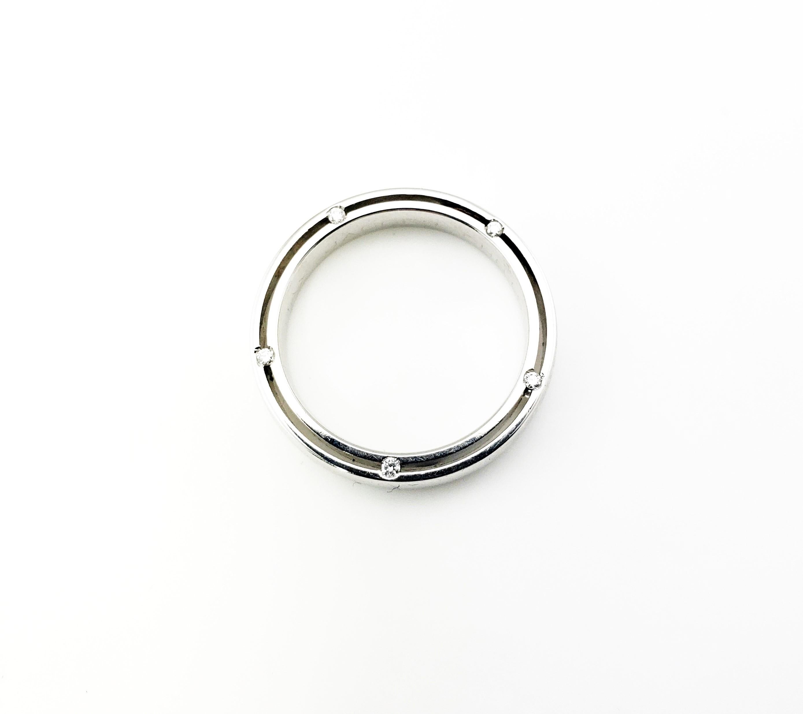Vintage Damiani / Brad Pitt 18 Karat White Gold and Diamond Wedding Band Ring Size 8

This stunning band features ten round brilliant cut diamonds on its edges - five on each side - set in beautifully detailed polished 18K white gold. Co-designed by