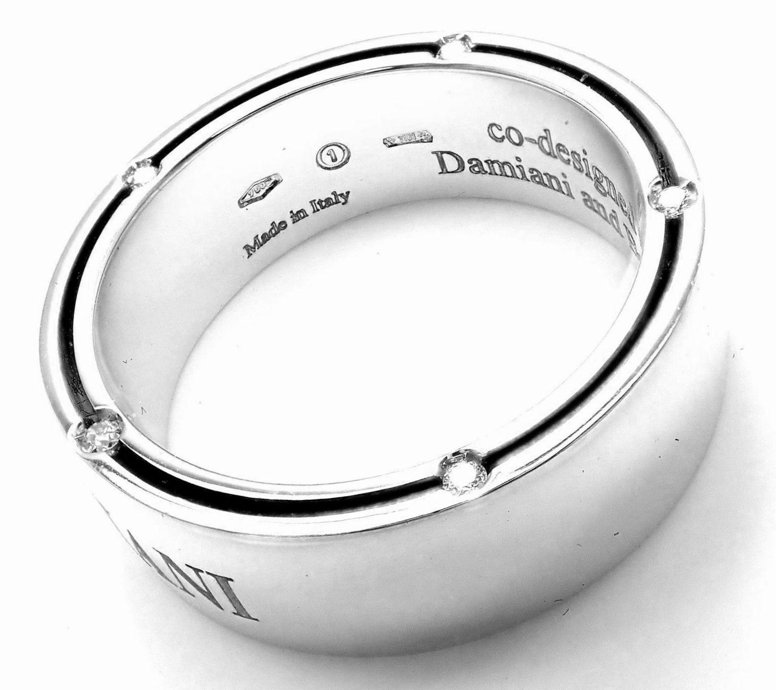 18k White Gold Diamond Band Ring by Damiani And Brad Pitt.
With 5 round brilliant cut diamonds total weight approx .10ct VS1 clarity, G color.
Retail Price: $3,590
This ring comes with Damiani Box + Paperwork.
Details:
Size: 7.5
Weight: 11.4