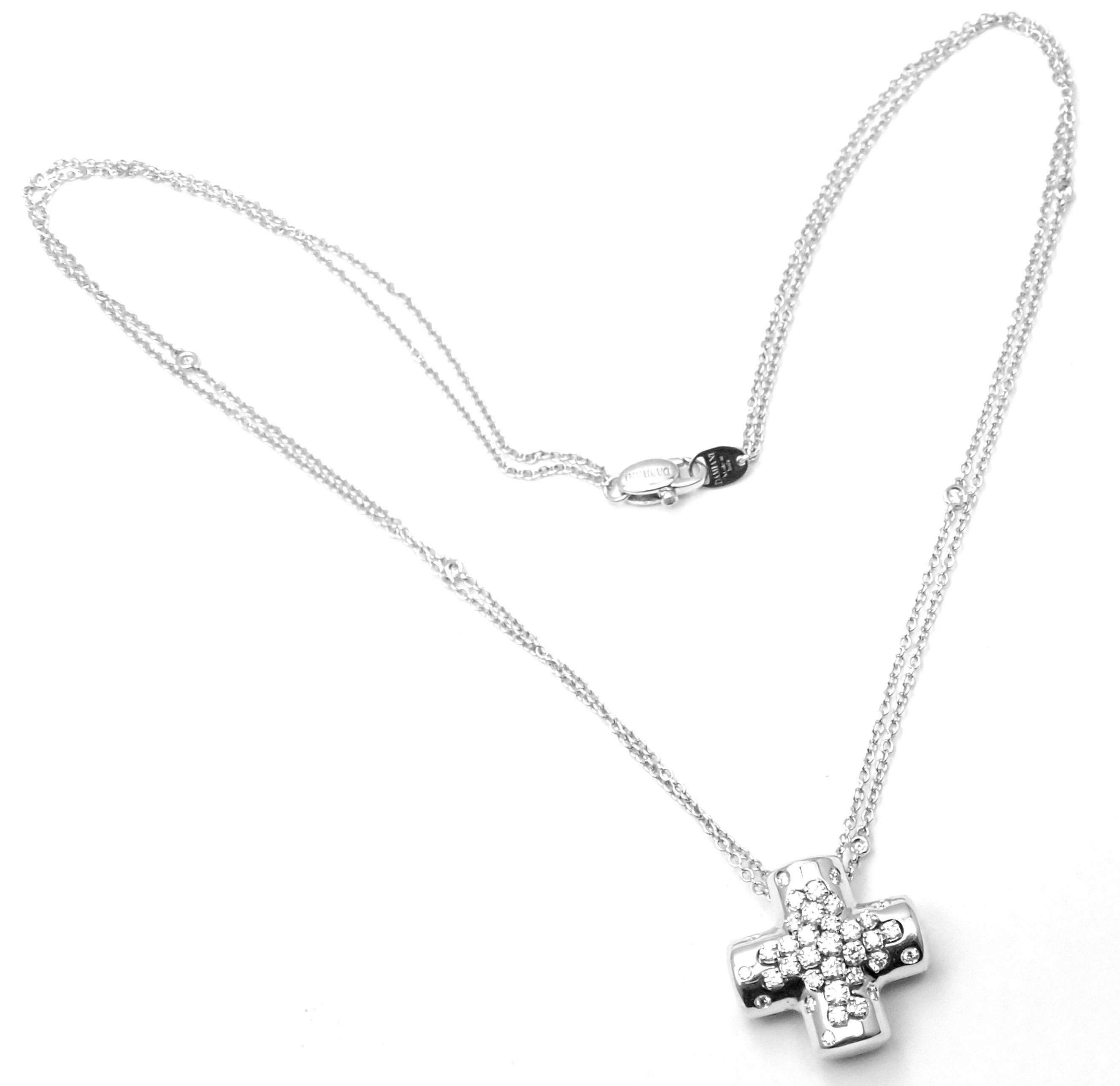 18k White Gold Diamond Cross Pendant Necklace by Damiani. 
With Round brilliant cut diamond E-G color, VS-SI clarity total weight approx. .92ct  
This necklace comes with Box, Certificate. Details: 
Measurements: 
Length: 18
