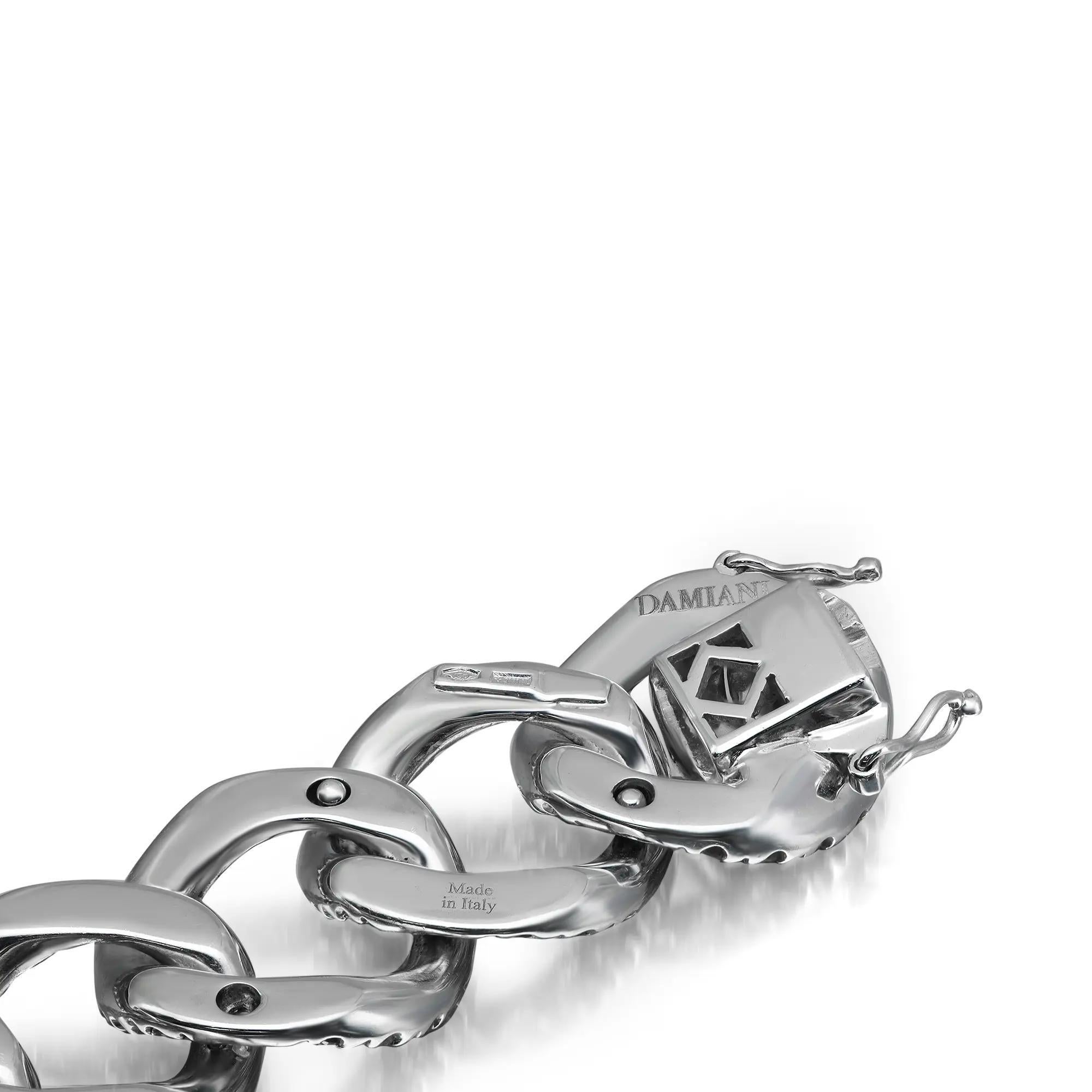 Flaunt this stylish chunky Cuban link chain bracelet, crafted in 18K white gold. Featuring, pave set round brilliant cut diamonds studded in a Cuban link chain bracelet. Total diamond weight: 12.16 carats. Diamond Quality: G-H color and SI clarity.
