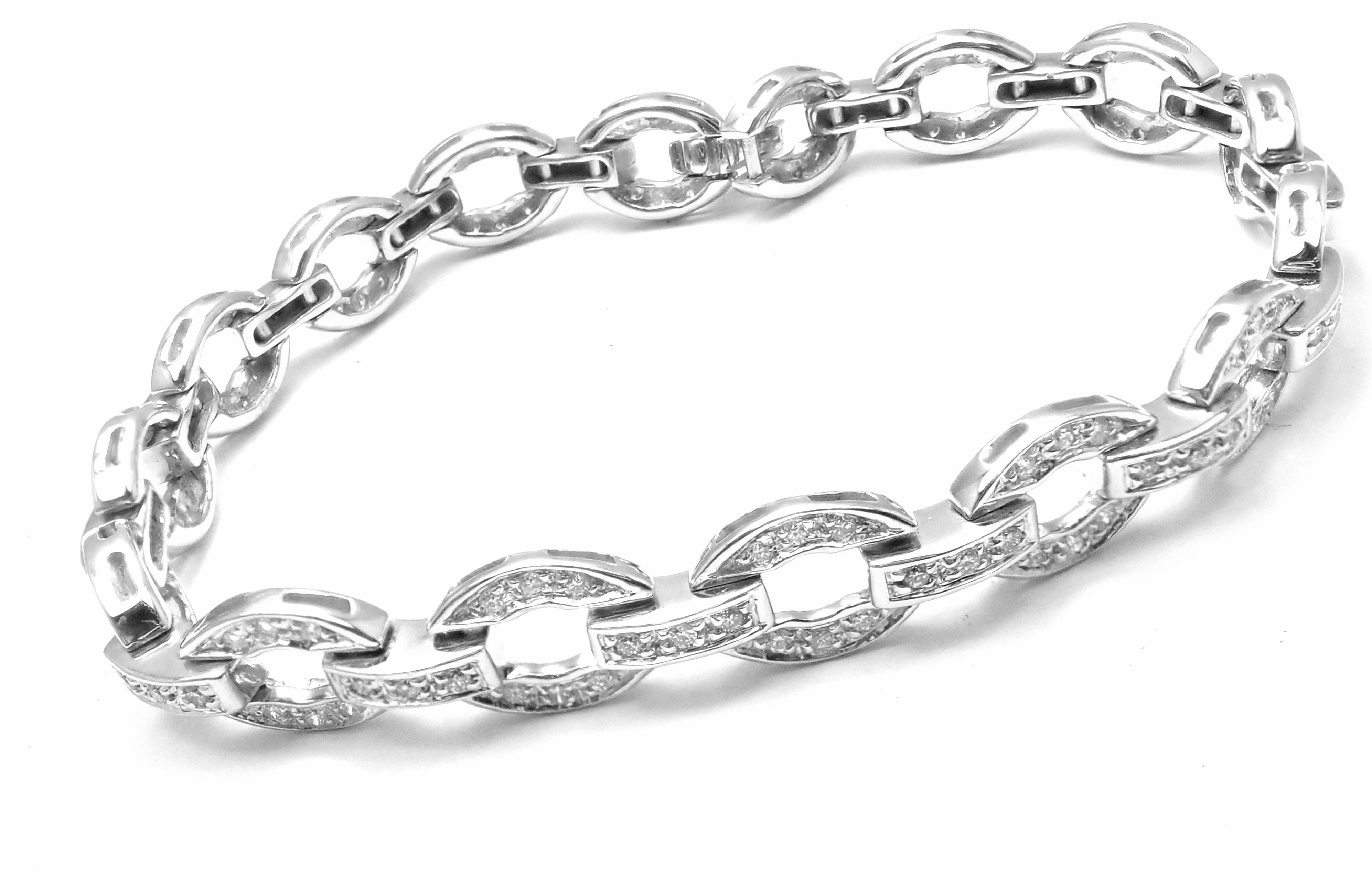 18k White Gold Diamond Tennis Bracelet by Damiani.
With Round brilliant cut diamonds E-G color, VS-SI clarity total weight approx. 1.02ct  
This necklace comes with Box, Certificate.
Details:
Measurements: Length: 7