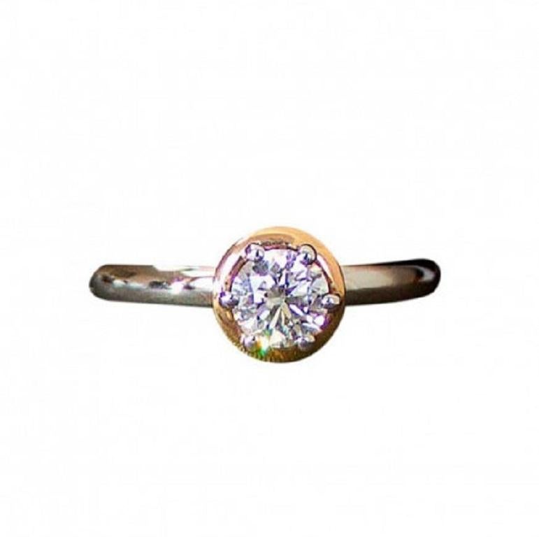 This Ladies ring is made of Platinum and 18k Rose Gold and comes in classic shape.
It`s set with a 0.5 Ct Diamond category IF (Internally Flawless), color G (Near Colorless)
The ring comes in size 7 and Luxury style.
Total weight of the item –