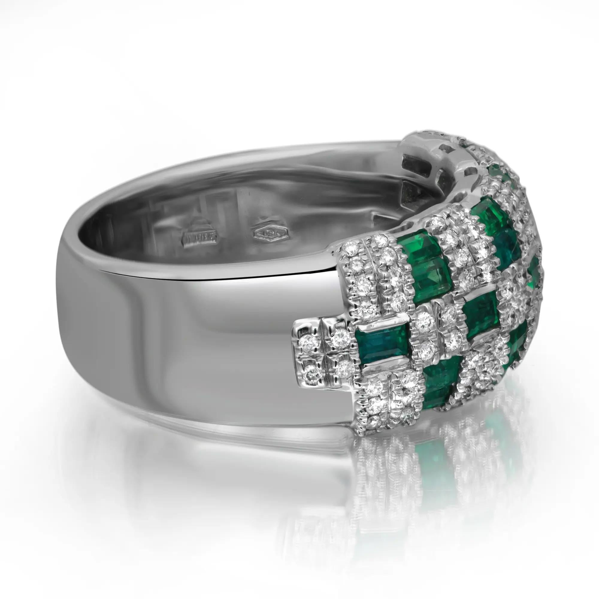 This Damiani cocktail band ring is crafted in 18K white gold, set with dazzling white round cut diamonds, totaling 0.53 carat and baguette cut emeralds totaling 1.06 carats. Ring size 7.25. Total weight: 14.73 gms. Perfect addition to your jewelry
