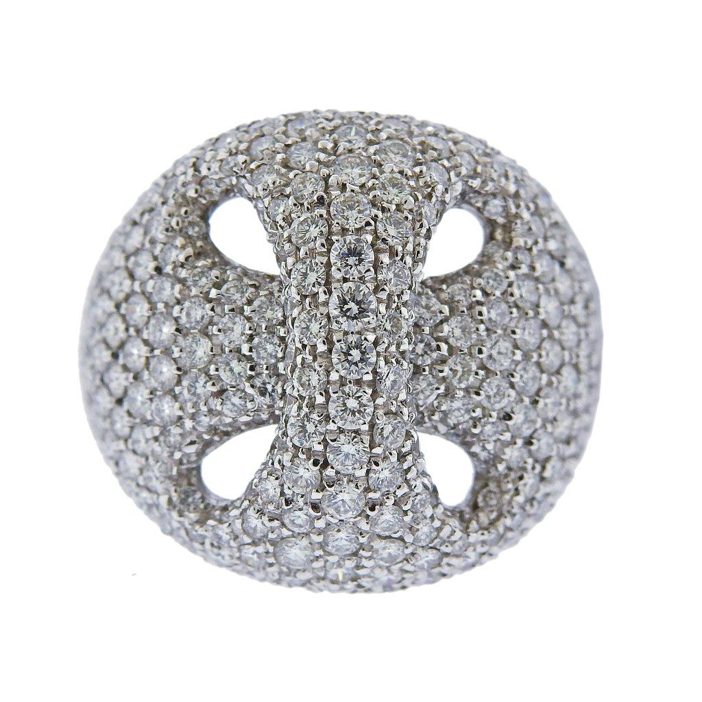 Brand new 18k white gold Damiani ring, set with approx. 3.21ct in G/VS diamonds. Retail $24740. Ring size - 7.5, ring top is 21mm wide. Weight is 19 grams. Marked Damiani, made in Italy, 750.