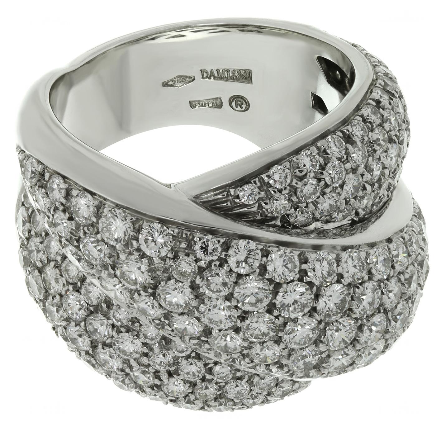This stunning Damiani ring from the classic Gomitolo collection features a sparkling entwined band design crafted in 18k white gold and pavé set with brilliant-cut round diamonds weighing an estimated 4.0 carats. Made in Italy circa