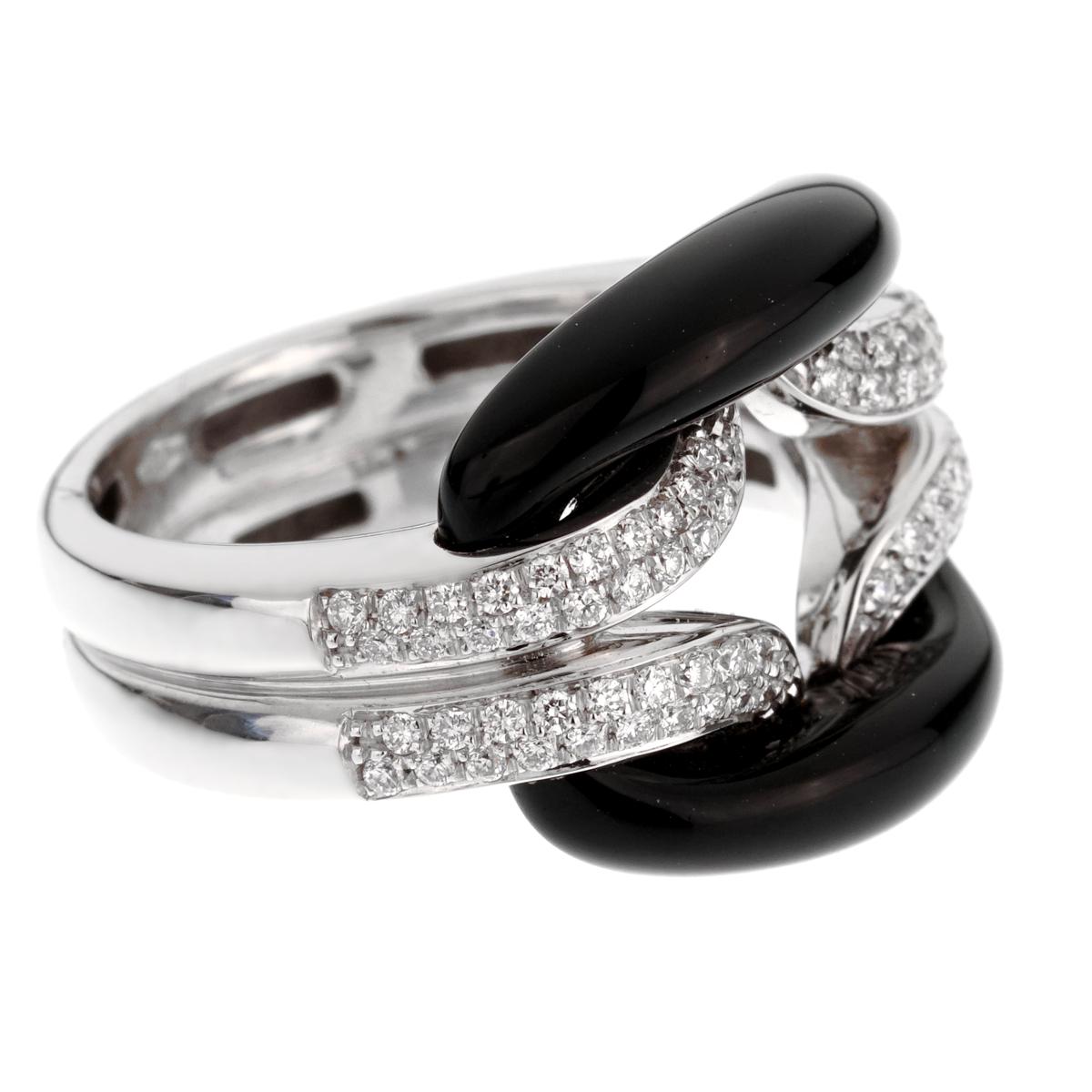 A chic Damiani diamond ring from the lace collection crafted in 18k white gold. The ring measures a size 4 1/2 and can be resized.

Retail Price: $5985 +Tax