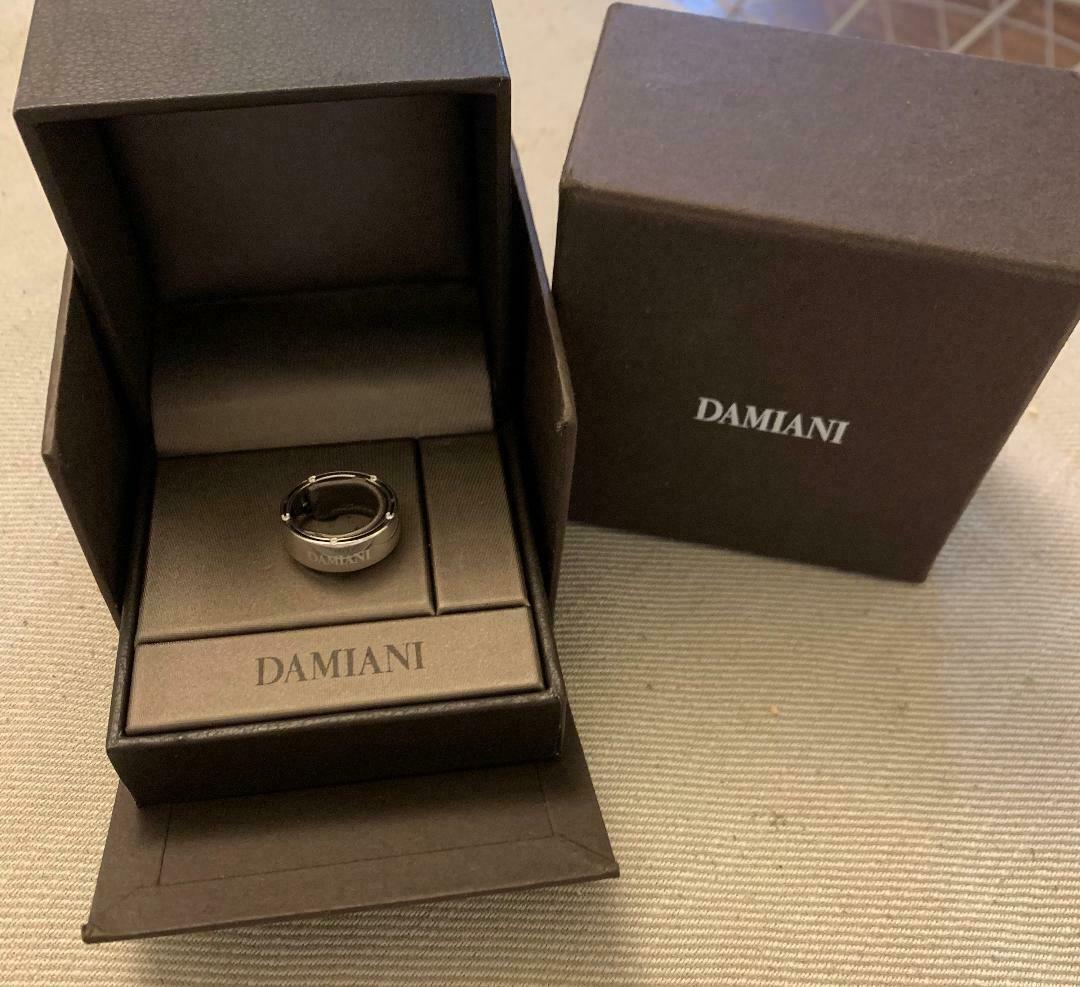 For auction is a Damiani 18k white gold and diamond ring. The ring is crafted in 18k white gold and 10 round brilliant cut diamonds. The ring is a size and weighs . The ring comes in the original fitted box. Get it now!



Brand: Damiani

Condition: