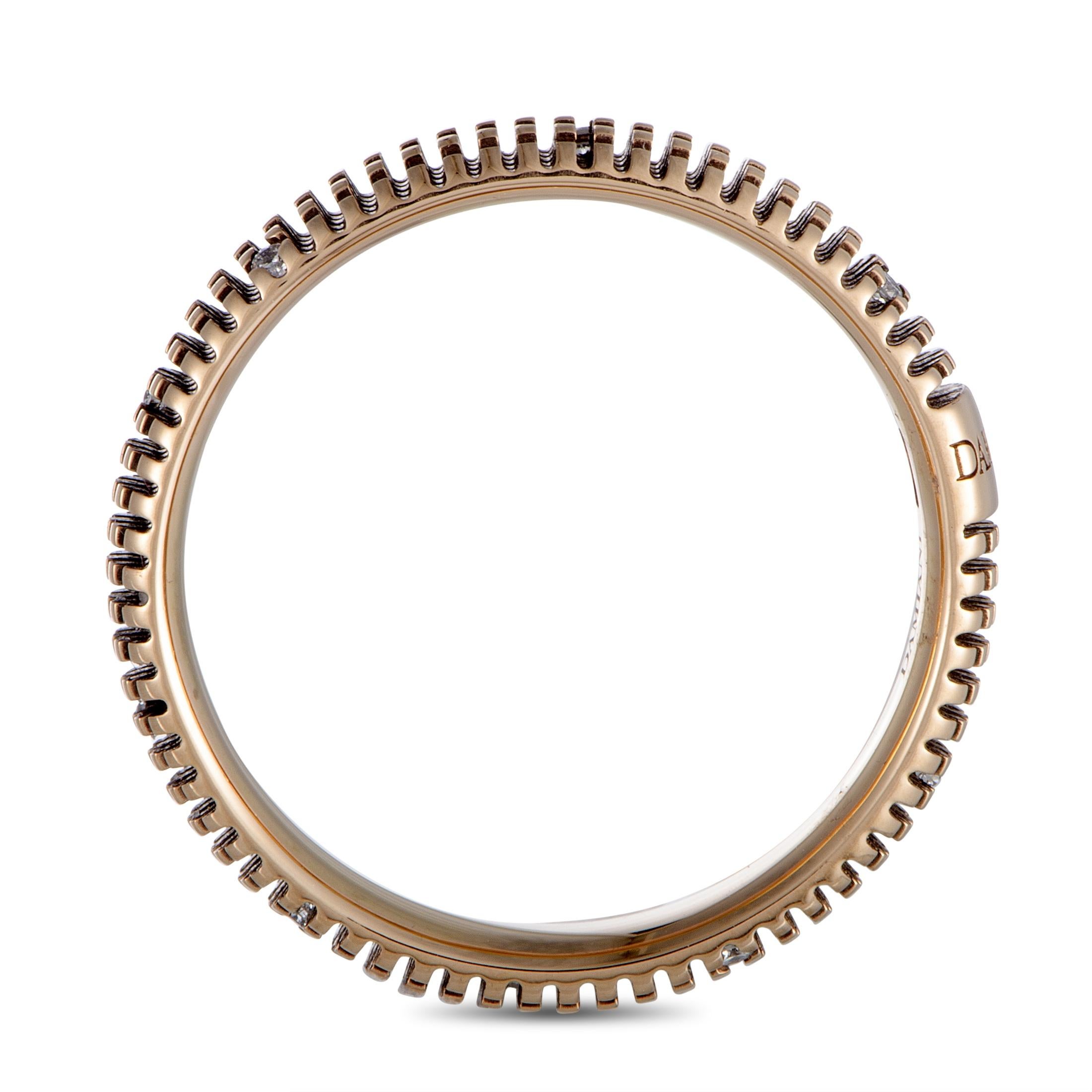 The Damiani “Metropolitan” band ring is made of 18K black and rose gold and set with diamonds that weigh 0.07 carats in total. The ring boasts band thickness of 4 mm and weighs 4.7 grams.
 
 This item is offered in brand new condition and includes
