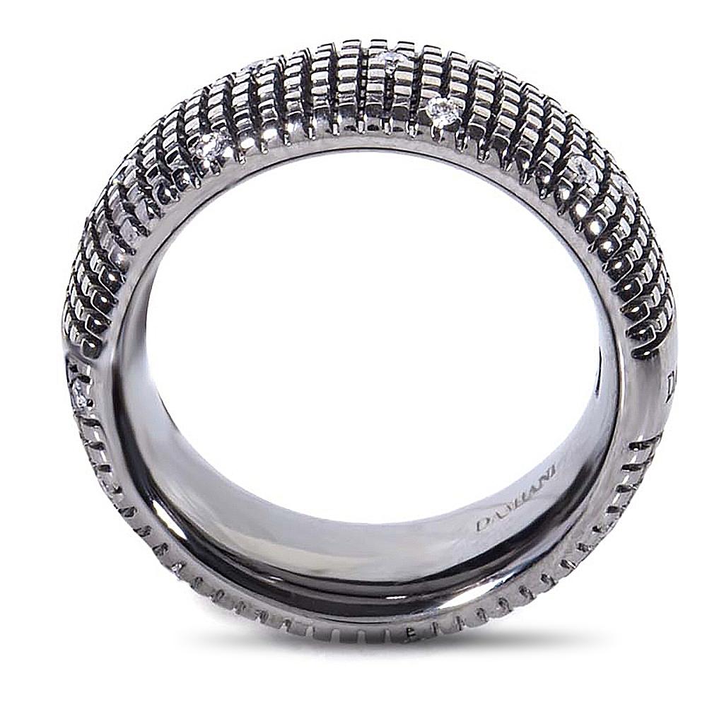 This band ring from Damiani is custom designed to be unlike any other. The ring is made of textured 18K black gold and is studded with 0.14 carats of diamonds.
 
 This item is brand new and comes with the manufacturer's box and papers.