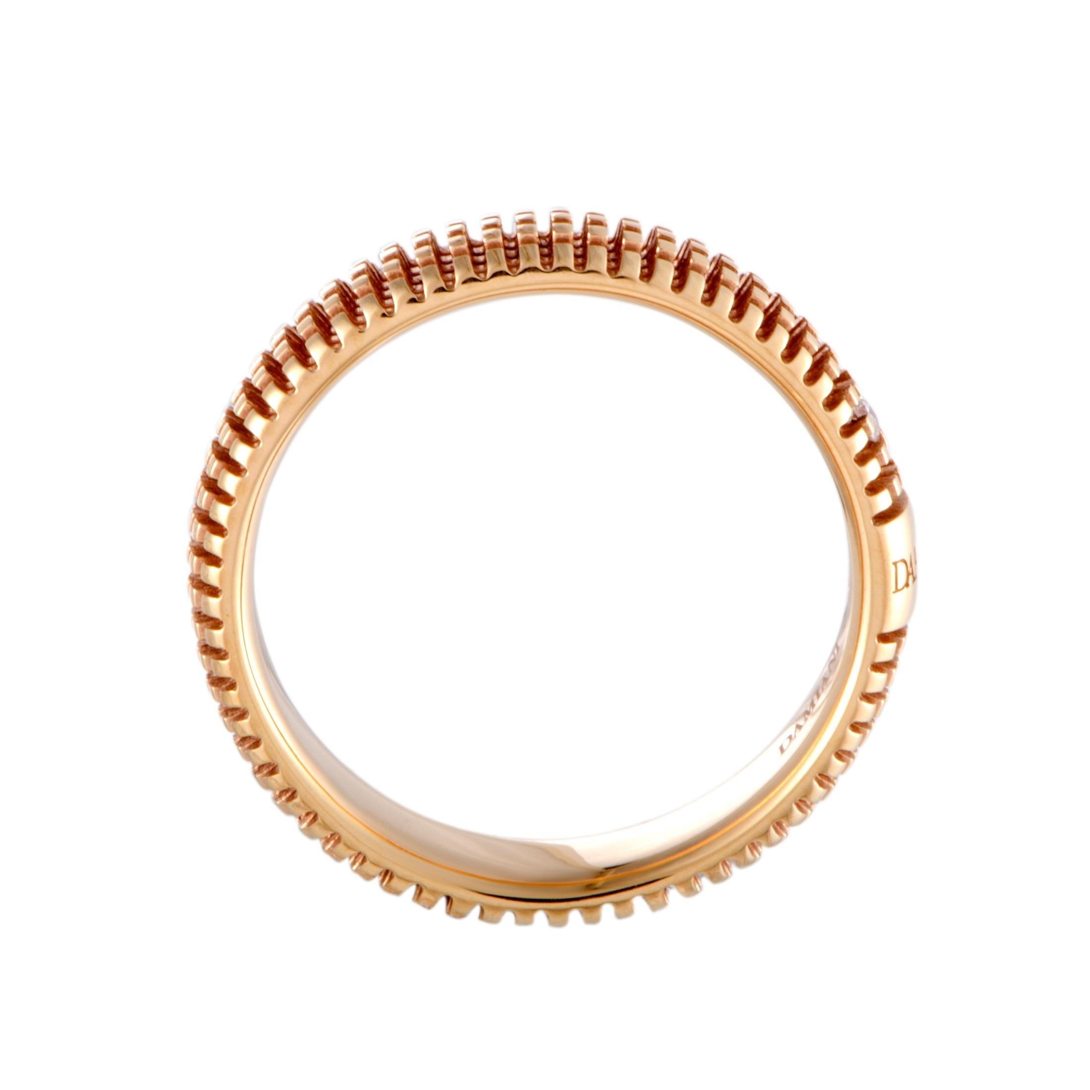 The exquisitely cut diamond stone is wonderfully set against the alluringly radiant rose gold in this exceptional jewelry piece that boasts a captivatingly prestigious appeal. The ring is splendidly designed by Damiani and it is beautifully crafted