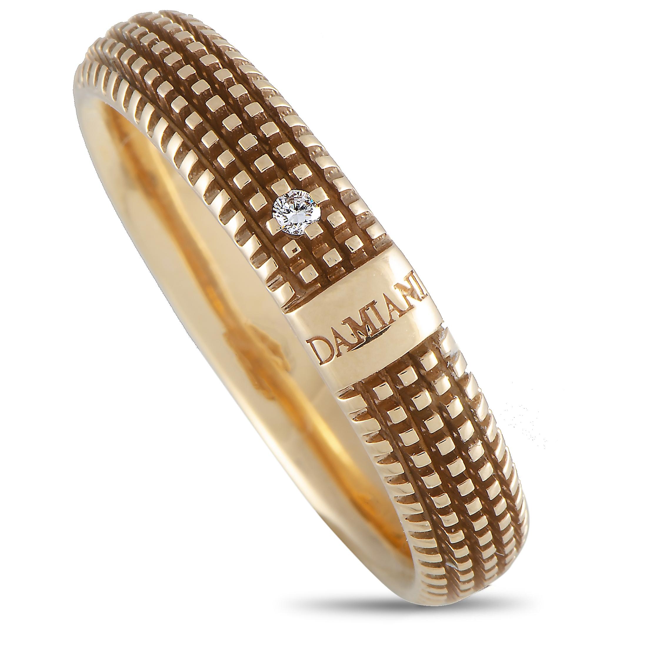 The Damiani “Metropolitan” band ring is crafted from 18K rose gold, boasts band thickness of 5 mm, and weighs 4.8 grams. The ring is set with a 0.01 ct diamond stone.
 
 This piece is offered in brand new condition and includes the manufacturer’s