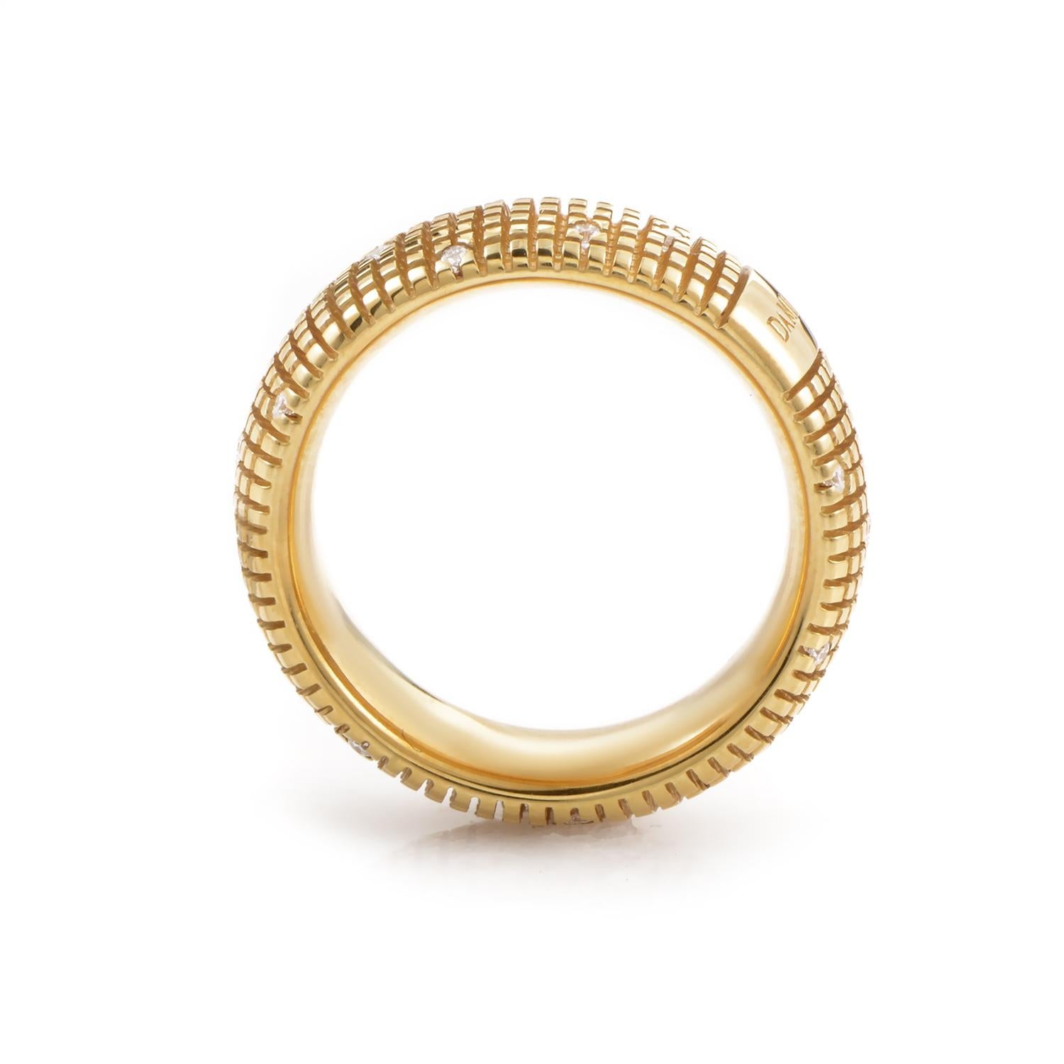 This band ring from Damiani has a fairly simple design that is still very distinguished. The ring is made of textured 18K yellow gold and is set with ~.14ct of diamonds.
