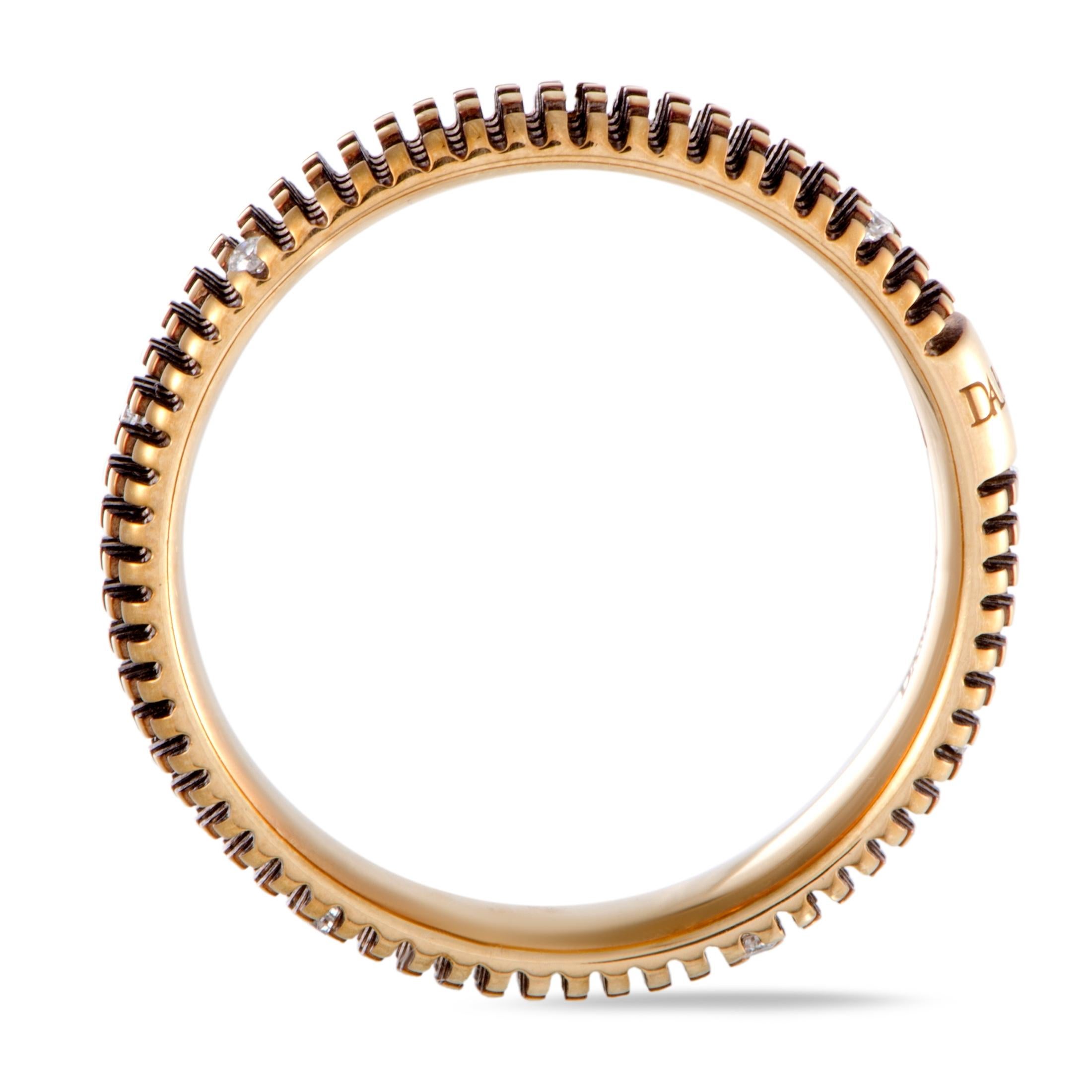 Extraordinarily envisioned, masterfully crafted, and accentuated in a most subtly luxurious fashion, this fascinating jewelry piece offers a stunningly offbeat appearance. The ring is wonderfully designed by Damiani and it is beautifully made of