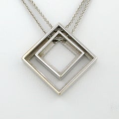 Collier et pendentif DAMIANI sertis de diamants taille brillant d'un poids total allant jusqu'à 0,55 ct, en or 18 carats