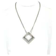 Collier et pendentif DAMIANI sertis de diamants taille brillant d'un poids total allant jusqu'à 0,55 ct, en or 18 carats