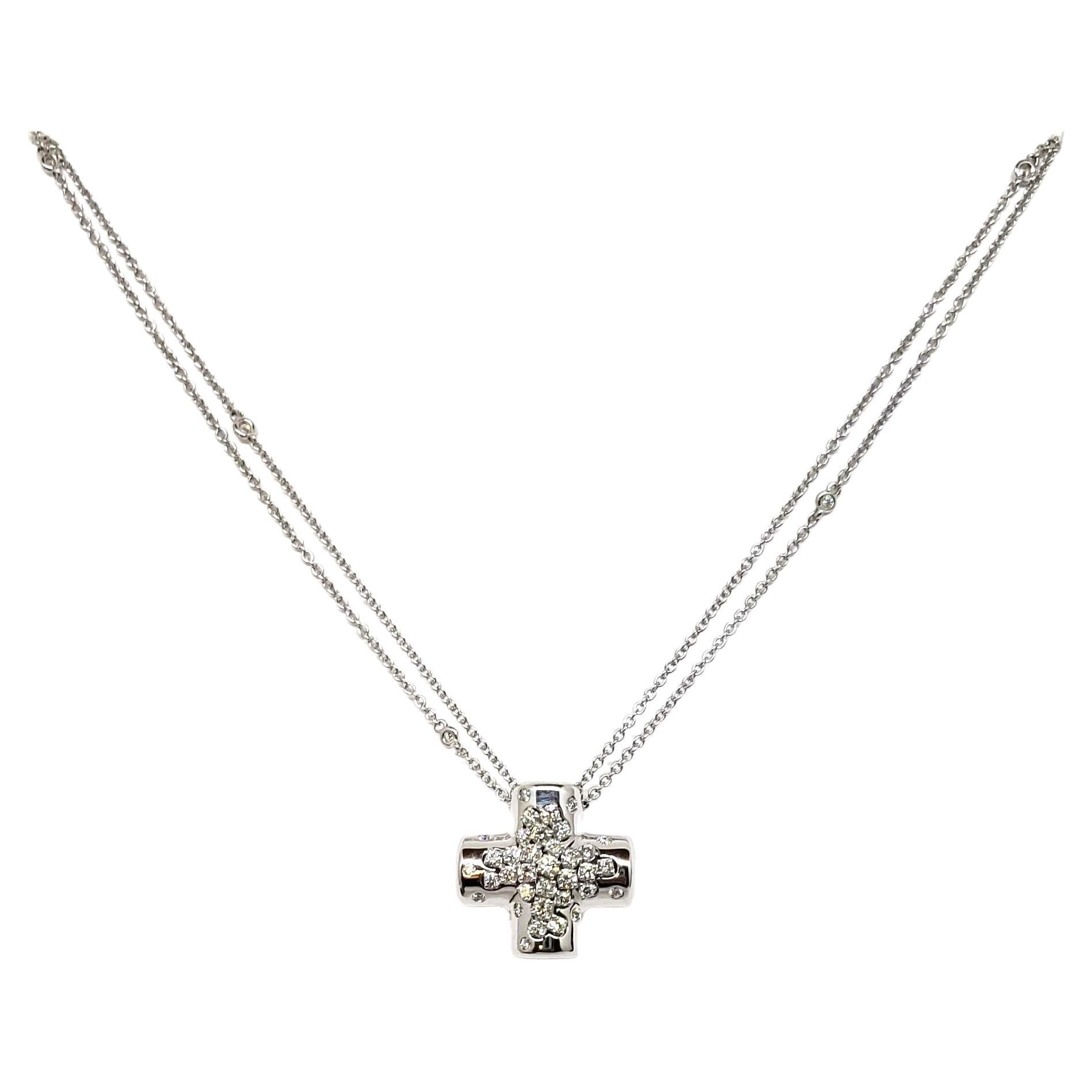 Damiani Paradise Collection, pendentif croix, or blanc 18 carats et diamants, 20042014