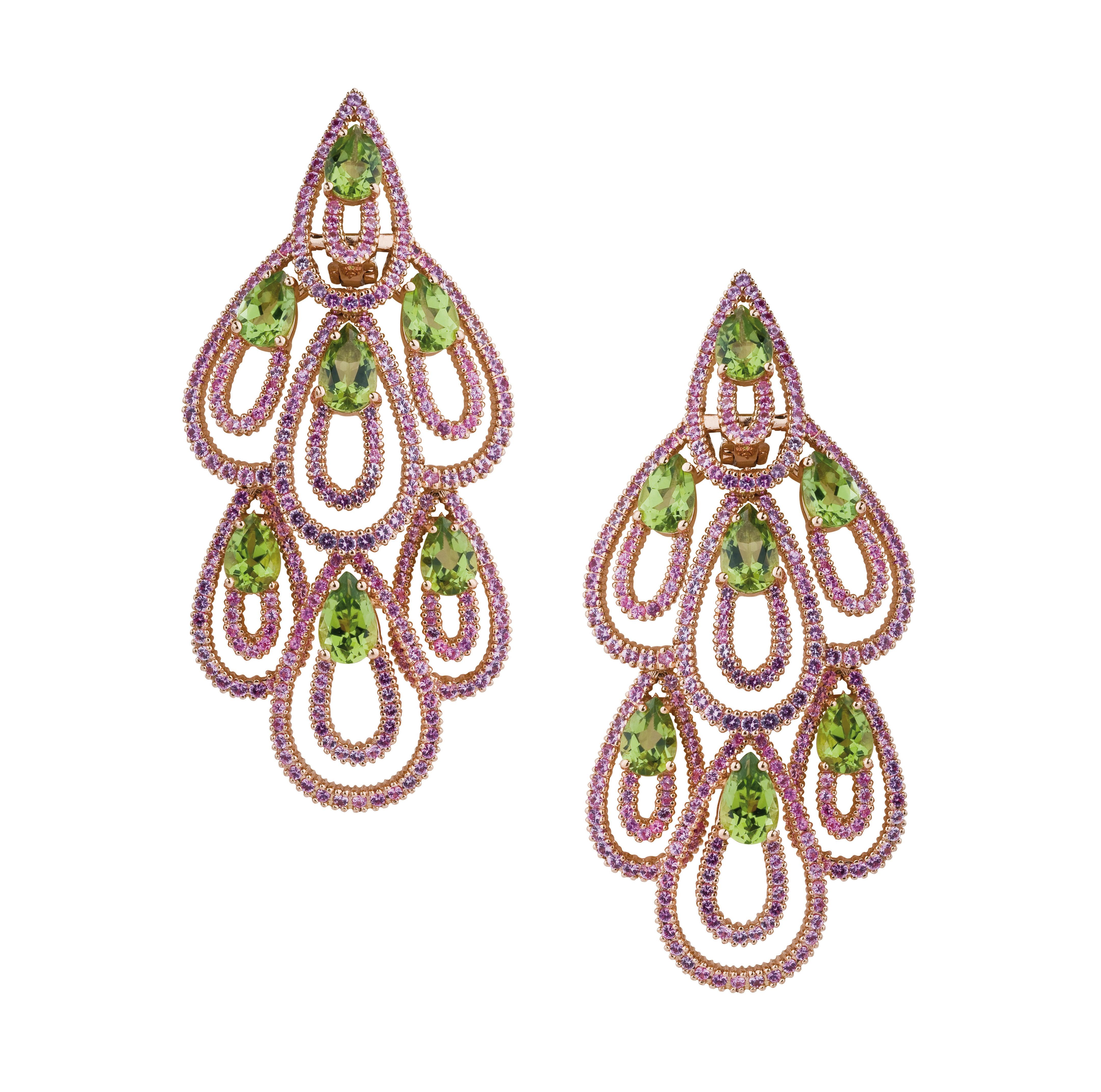 Pink Sapphire and Peridot Earrings mounted on rose gold 18K.
Sapphires: 6.40 carats, Peridot: 11.30 carats.
Total weight: 39.30 grams.