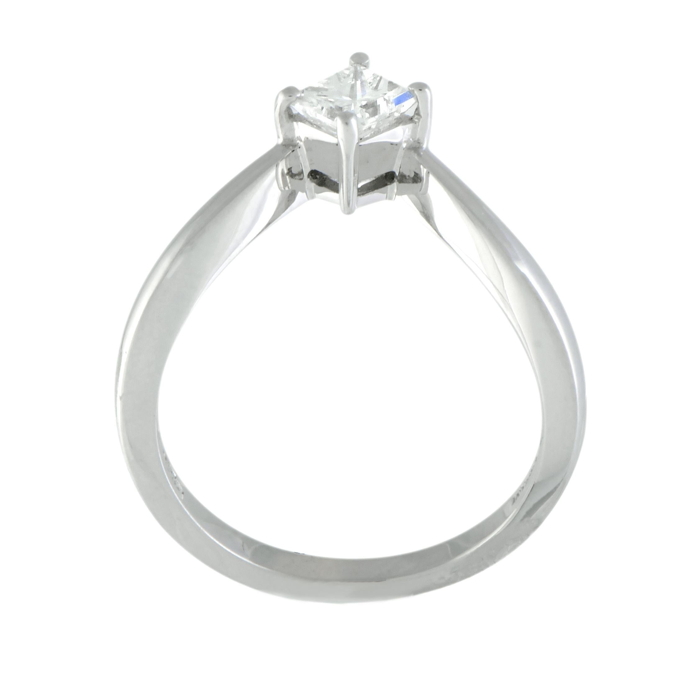 This engagement ring by Damiani has a uniquely elegant design that is sure to please! The ring is made of platinum and boasts a .54ct F-color, VS1 clarity princess-cut diamond. Lastly, this gorgeous ring is accompanied by an HRD certificate.
 Ring