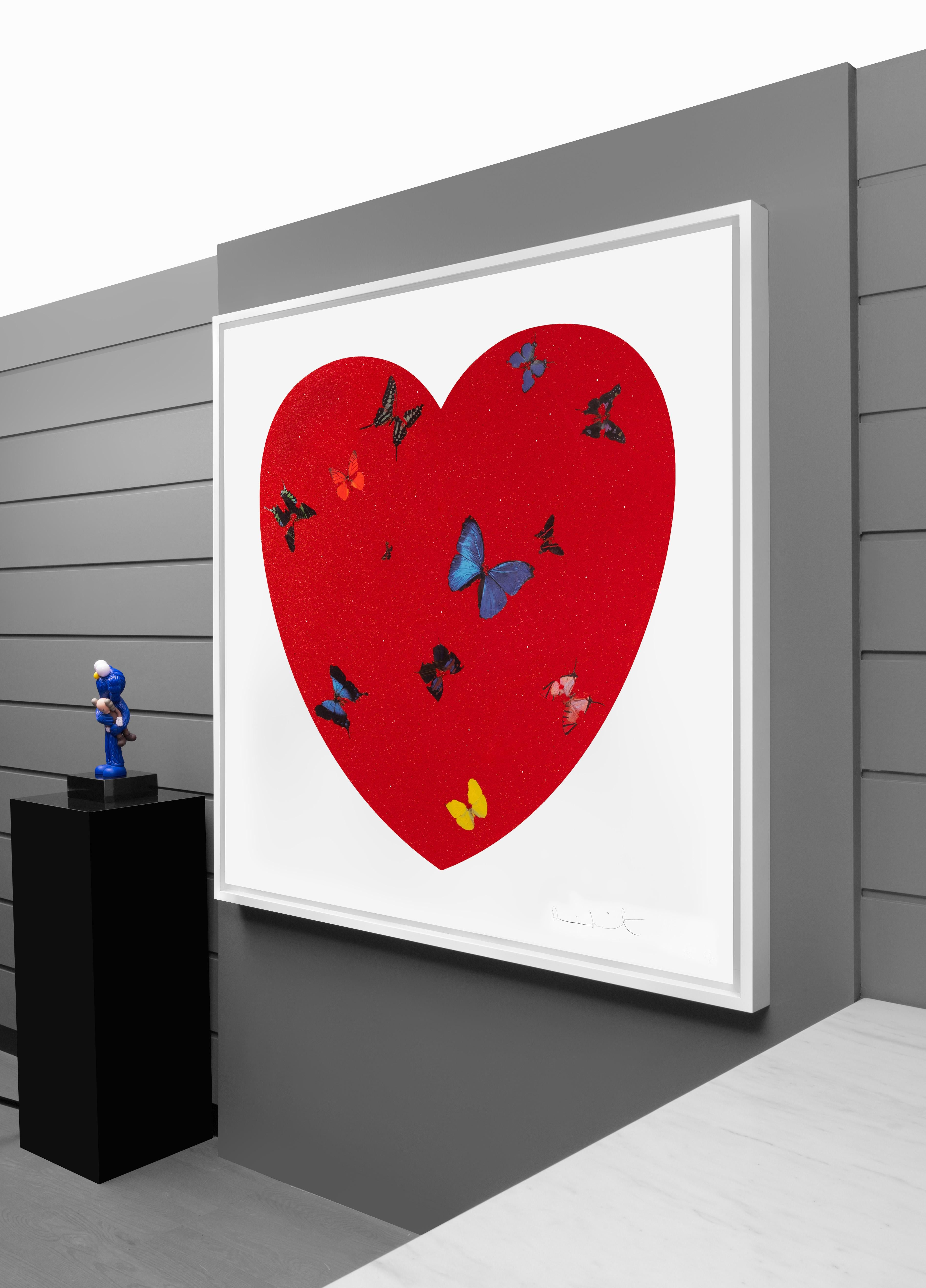 The ‘All You Need Is Love, Love, Love’ butterfly heart with diamond dust by contemporary master artist, Damien Hirst, was created in 2010. The large-scale glittering artwork is a silkscreen print with layers of genuine diamond dust. The blue chip