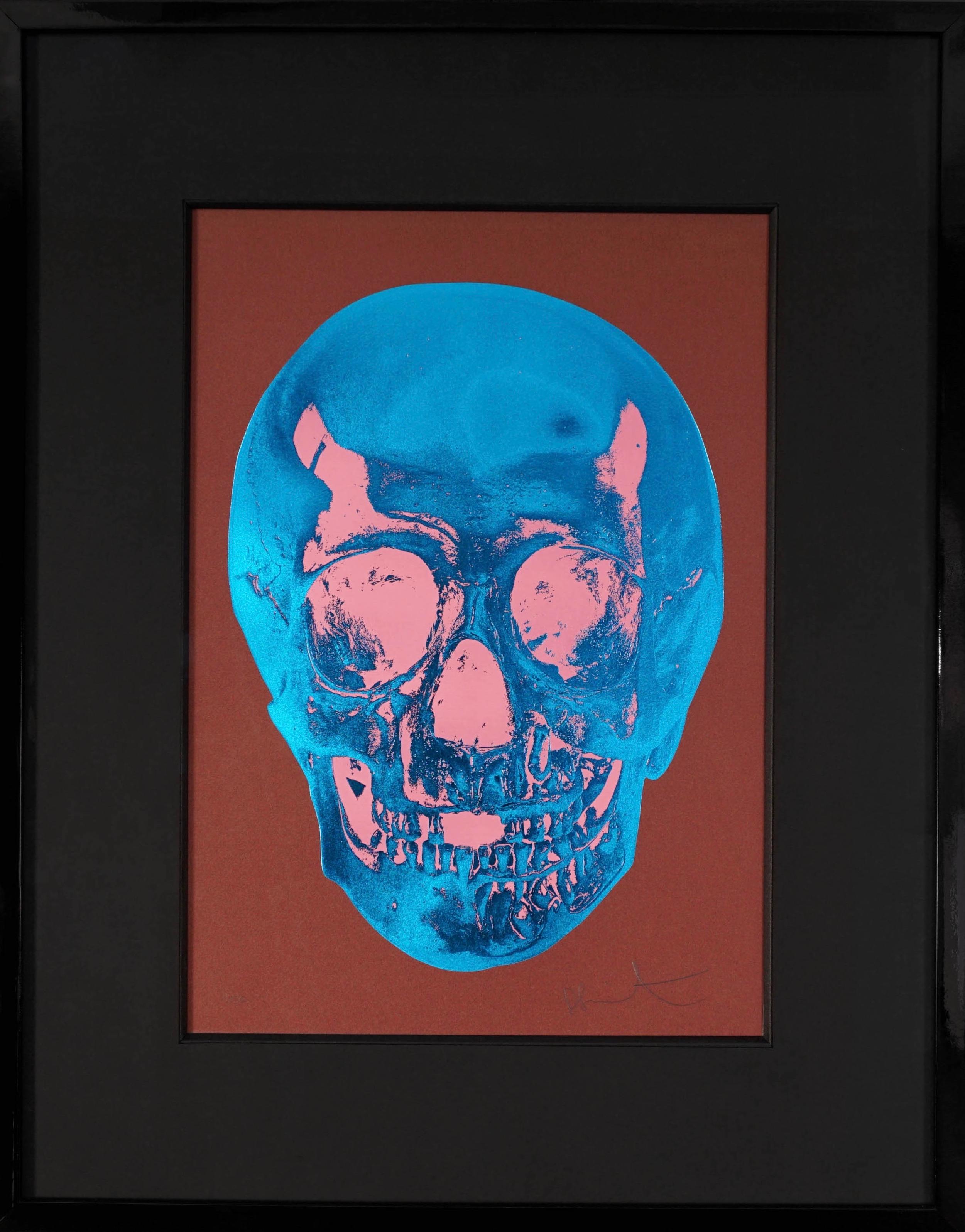 The ‘Till Death Do Us Part Skull in brown and cobalt blue is by master contemporary artist, Damien Hirst. This 2012 skull series is created in a small edition of only 50 pieces, each signed and numbered by the artist in pencil on the lower right