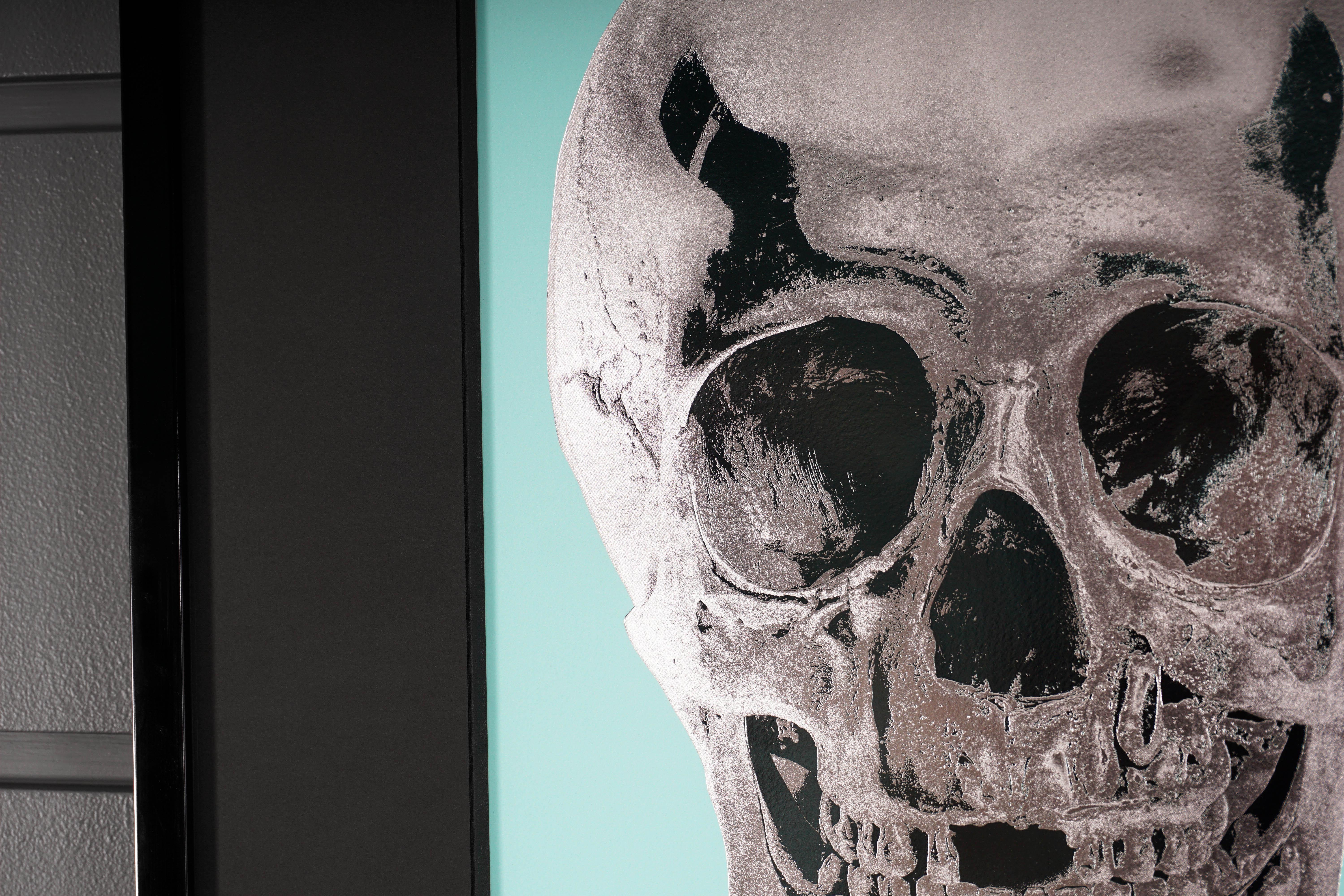 The ‘Till Death Do Us Part Skull in bright aquamarine is by master contemporary artist, Damien Hirst. This skull series is created in a small edition of only 50 pieces, each signed and numbered by the artist in pencil on the lower right corner. The