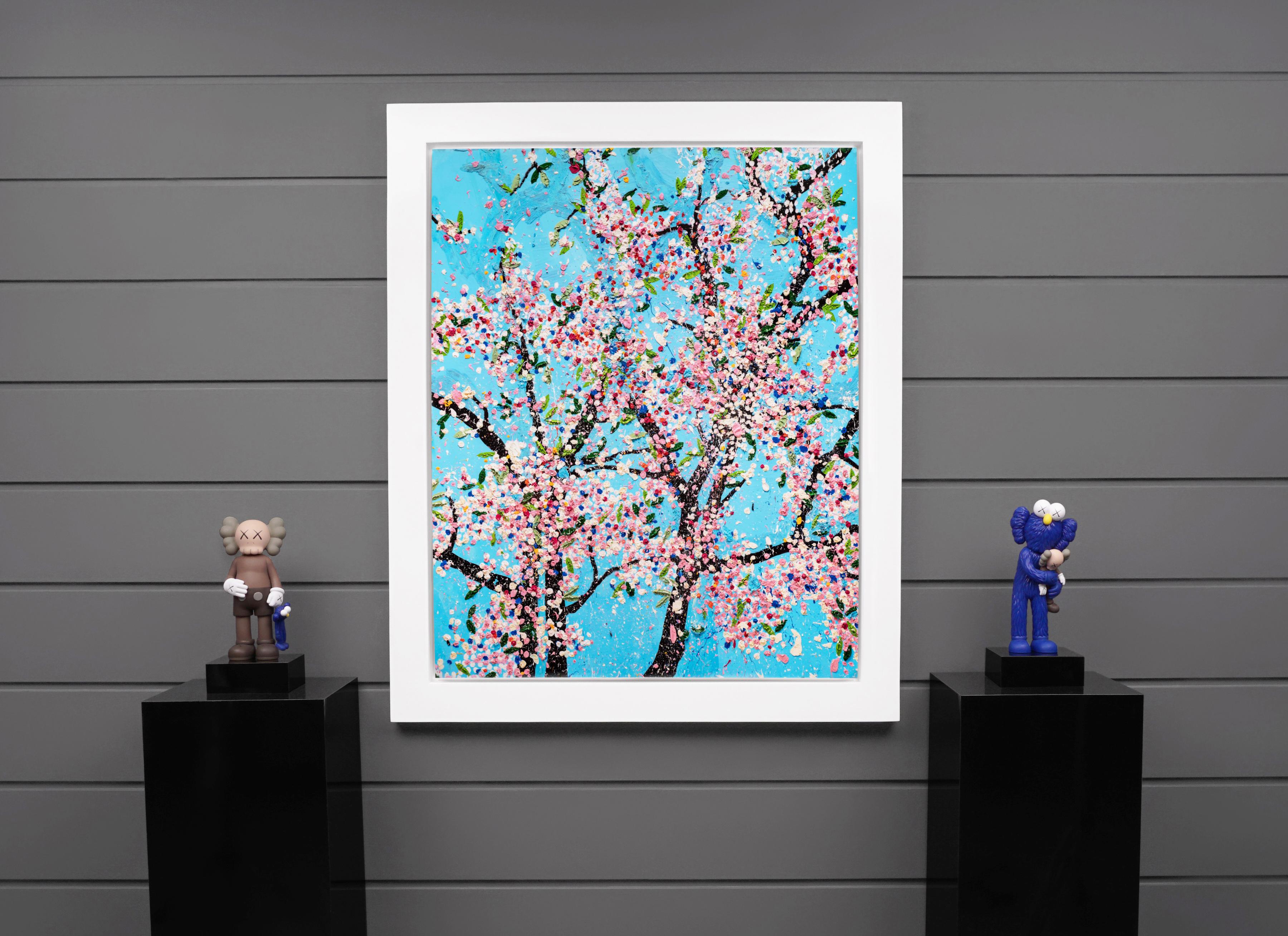 The contemporary pop art cherry blossom ‘Politeness’ is one of the eight from the iconic ‘Virtues’ series by Damien Hirst, the laminated giclée print on aluminum panel was created in 2021 as a reflection of his latest exploration as a master